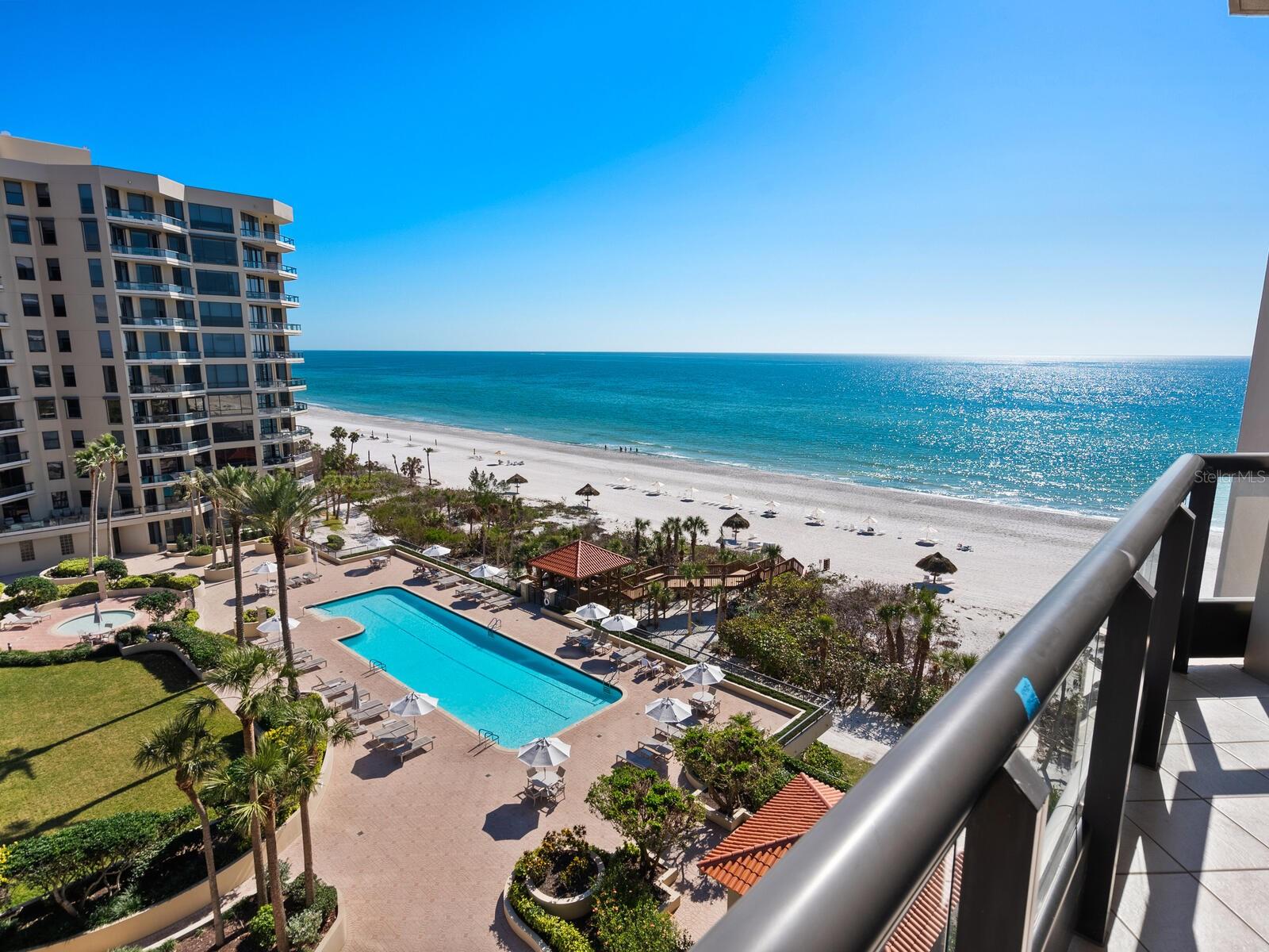 Looking for that unique beachfront retreat? Why not design it yourself! With breathtaking views spanning from the Gulf of Mexico to Sarasota Bay, this three-bedroom, four-bath retreat spans over 3,000 square feet and offers the ideal canvas to create a one-of-a-kind coastal masterpiece tailored to your vision. With the shimmering Gulf of Mexico to the west, Water Club's world-class amenities below and Sarasota Bay to the east, you’ll be immersed in a panorama of breathtaking tropical beauty. The primary suite is a private sanctuary, boasting a spacious walk-in closet, a secluded beachfront terrace and dual baths. On the opposite end of the home, a deluxe en-suite guest room with a large walk-in closet awaits. The versatile den/office space was designed to easily convert to a third bedroom with a full bath across the hall. Designed for functionality and style, the gourmet kitchen includes stylish white cabinetry, stone countertops, a center island and a cozy breakfast nook overlooking the beach. The spacious great room offers endless configuration possibilities and direct access to the main balcony. A semi-private elevator provides effortless access to some of Longboat Key’s most desirable amenities, including impeccable concierge service, an 18,000-square-foot clubhouse featuring a fitness center, spa, game room, library and ballroom, a heated beachfront pool and spa, fire pit courtyard, and Har-Tru tennis courts, and 24-hour gated security for ultimate peace of mind. Set on 16 acres of lush tropical landscaping, Water Club boasts 680 feet of private beachfront and welcomes pets. This premier beachfront community offers the best of island living including golfing, boating, unique boutiques, exceptional dining, and the arts and entertainment of downtown Sarasota just minutes away. Experience the pinnacle of coastal luxury at Water Club where every day is a celebration of Longboat Key’s beauty and serenity.