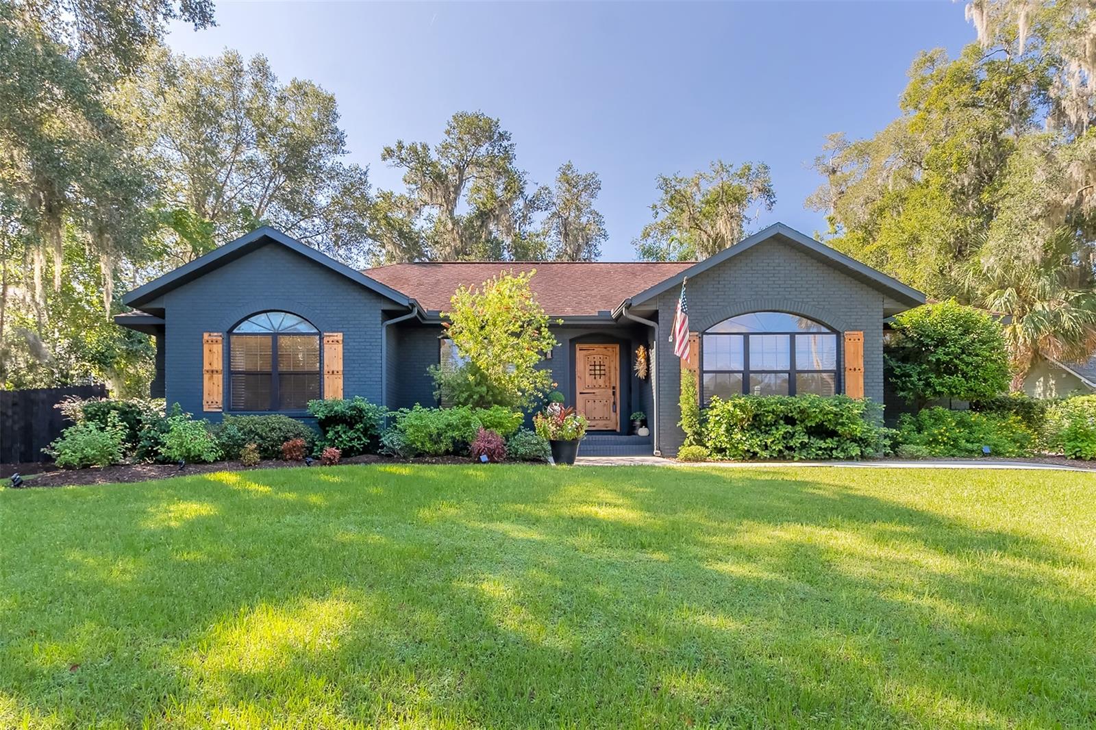 Discover refined living in this custom brick home, perfectly situated in the heart of DeLand, a stone's throw from local attractions and the vibrant culture of downtown. Expertly and meticulously renovated, this residence harmoniously blends modern sophistication with timeless design elements. Offering a highly sought-after layout, it features a formal dining area, a versatile flex room—ideal for your home office, playroom, or entertainment space—and a spacious family room that seamlessly flows into an open-concept kitchen with an inviting eat-in dinette. The master suite, a luxurious retreat, is strategically positioned on one side of the home for privacy, while the opposite end houses two generously sized bedrooms, two full bathrooms, and a convenient indoor laundry room. The kitchen stands out as a focal point, adorned with gleaming granite countertops, a classic farm-style sink, soft-close cabinets and drawers, and state-of-the-art stainless steel appliances. Maintaining a lush green landscape is effortless with the property's in-built irrigation system. Located just minutes from Stetson University and surrounded by numerous parks, boutiques, and eateries, this home offers both seclusion and connectivity. Welcome to 208 W Stetson Avenue, where luxury meets locality. All information intended to be accurate however not guaranteed. ;Water: City