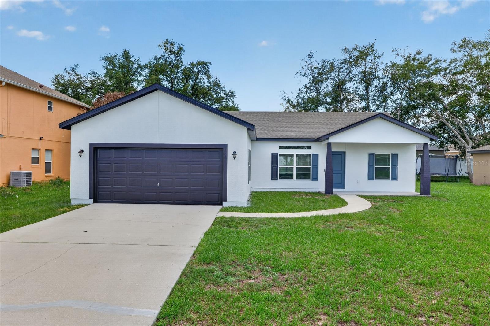 Welcome Home! This stunning 3-bedroom, 2-bathroom residence in Kissimmee combines modern style with everyday comfort. Inside, you'll find a bright, open-concept layout designed to maximize space and natural light, creating a warm and welcoming environment.

The well-appointed kitchen showcases sleek countertops and stainless steel appliances, making it ideal for both everyday living and entertaining guests.

Step outside to a spacious backyard, perfect for relaxing, outdoor dining, or hosting gatherings with family and friends. Additional highlights include washer and dryer hookups, a private driveway, and a two-car garage for added convenience.

Don't miss the opportunity to make this exceptional home yours—schedule a tour today before it's gone! Multiple offers -please submit highest and best by Monday, June 15th 3PM.
