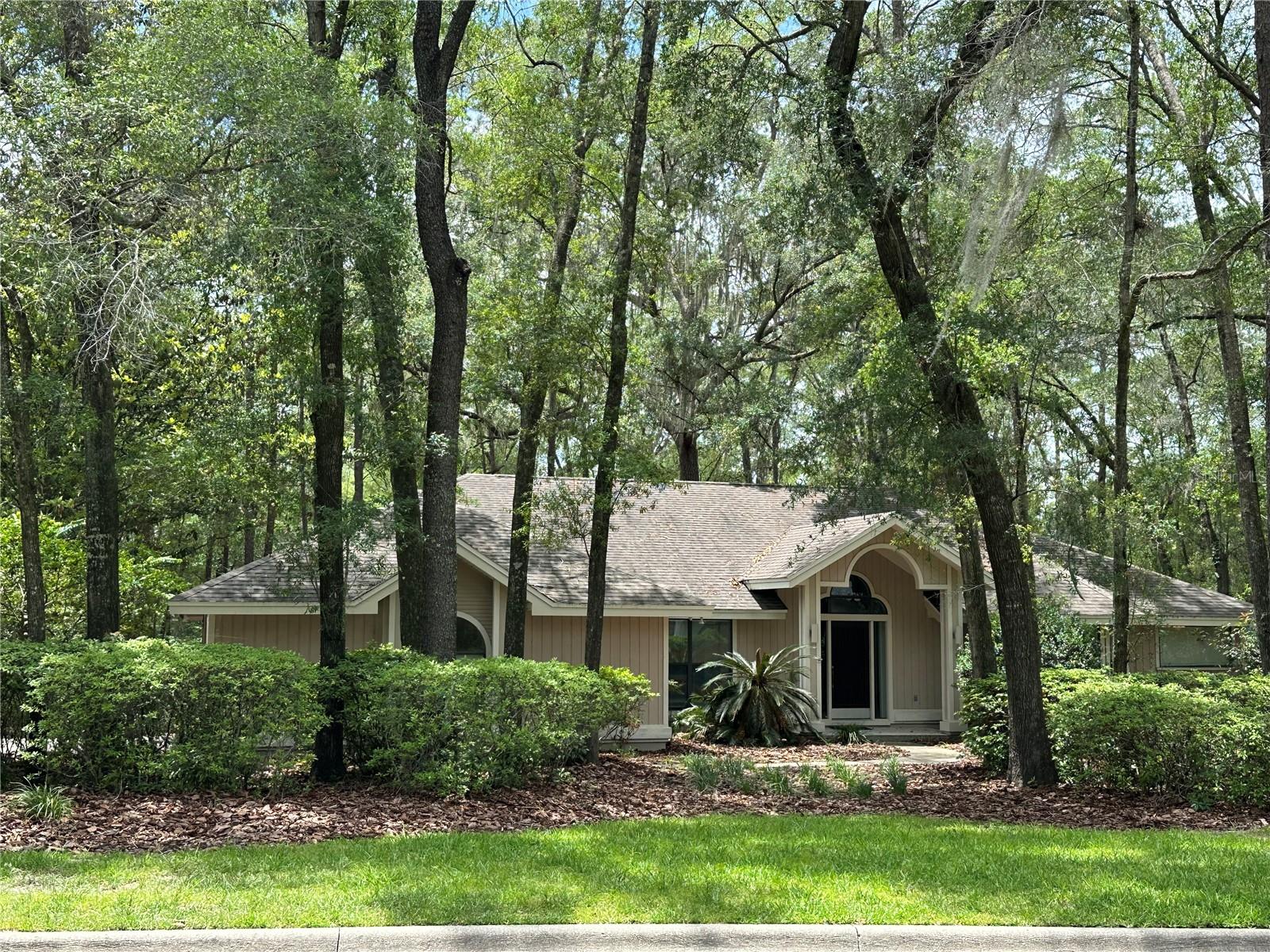 Very nice home in Haile Plantation. The Preserve is directly across from The Haile Village Center, just east of 91st St. This Home has 2,800 plus square feet, 5 bedrooms and 3 full baths and one half bath. Side entry garage makes parking a breeze and the separate very large laundry room makes this chore bearable. There is a nice deck on the rear of the home with views of the wooded back yard. The lot itself is just shy of half an acre.  The floorplan is a three-way split with three of the bedrooms on one end of the house and the master and the last at the other end. The bedroom near the master is the smallest and probably intended as a nursery but could easily be an office. The home has great school zones and is perfectly situated for shopping and easy access to I-75 or points west.
