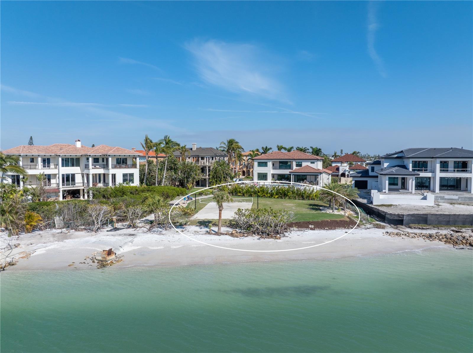 CAN BE SOLD WITH MLS NUMBER: A4641964. A truly once-in-a-lifetime opportunity, this pristine Gulf-front parcel with naturally white sand along the breathtaking shores of Siesta Key’s exclusive northern tip. As one of the last remaining buildable Gulf-front lots on the island, this expansive property presents an unparalleled canvas to create a custom waterfront estate or an exceptional investment in luxury real estate.
Positioned in one of Florida’s most coveted coastal enclaves, this direct beachfront lot provides a rare combination of privacy, prestige, and proximity. A short ride leads to the vibrant Siesta Beach and Village, yet the setting remains peacefully secluded, offering an idyllic retreat for those seeking both tranquility and convenience.
Endless Possibilities on the Gulf! Creative Seller Financing Available!

Consistently ranked among the world’s top beaches, Siesta Key is celebrated for its powdery sand, crystal-clear waters, and vibrant island culture. This exclusive Gulf-front property not only offers a rare chance to own a piece of this world-renowned paradise but also represents a sound long-term investment in one of Florida’s most sought-after luxury markets.

Whether you seek to build a personal beachfront sanctuary or develop a estate that defines Gulf-front luxury, this extraordinary Siesta Key lot provides the perfect foundation for an unparalleled coastal lifestyle. Opportunities of this caliber are exceedingly rare—seize the chance to craft your dream on one of the most spectacular stretches of beachfront in the United States.