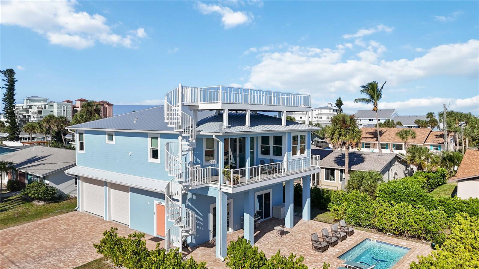 Welcome to your true boat-to-beach sanctuary on Manasota Key. Thoughtfully built in 2022 to FEMA flood standards, this coastal haven offers both comfort and confidence. Hurricane-impact windows and sliding glass doors are installed throughout, and the property is pre-wired for a whole-house generator to provide peace of mind in any season. Deeded Gulf access means you’re always moments from the sand, and your private dock—overlooking some of the best fishing on the Key—includes your owned boat slip and lift, making every day a boating day. Inside, premium finishes and thoughtful coastal design create a warm, welcoming elegance. Hands-free faucets and a custom epoxy “beachscape” island top make the kitchen a true showpiece. The primary suite features an oversized custom shower designed for relaxation and comfort. The lower level includes a full bedroom and bathroom with mini-split air systems—ideal for guests or multigenerational living. A pre-built elevator shaft provides future flexibility if desired. Step outside to a heated pool/spa with wrap-around seating, perfect for unwinding after a day on the water. Then head up to the rooftop observation deck for breathtaking 360° views of Lemon Bay and the Gulf of Mexico—sunrise to sunset. Insurance remains attractively low at approximately $3,000 annually, which is rare for a coastal home of this caliber. And with a location just 0.2 miles (a short stroll) to the restaurant circle and daily beach yoga, this home delivers the ultimate combination of luxury, lifestyle, and walkability on Manasota Key.