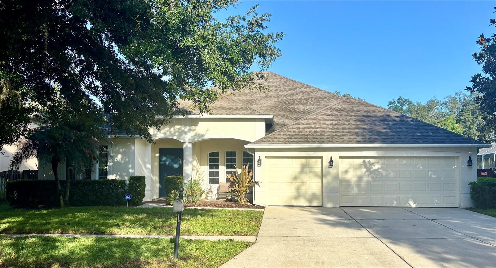 Welcome home!! Step into this lovely home in the peaceful Lake Weeks community. The heart of the home features a gourmet kitchen with quartz countertops, a large center island, and plenty of space for cooking and entertaining. Enjoy both a formal dining room for special occasions and a cozy dining nook that flows seamlessly into the adjoining family room. The expansive main living area is filled with natural light and opens through triple sliding patio doors to a spacious covered lanai, creating the perfect indoor-outdoor living experience. The luxurious primary suite offers a relaxing retreat with a garden tub, separate walk-in shower, and a unique private passage to an adjoining flex room—ideal for a home office, nursery, fitness room, or private sitting area. Upstairs, you'll find an incredible bonus living space that can be customized to fit your lifestyle. It includes a full bathroom with direct access to a separate bedroom featuring a spacious walk-in closet, making it perfect for guests, multi-generational living, or a private suite. You'll also appreciate the abundance of storage with a large dedicated storage room. Built in 2005 and very well maintained, home improvements include full roof replacement in January 2024 with some  windows hurricane proofed and replaced. With these major improvements,  ownership of this house will be easier and more enjoyable.  Located in a desirable gated community, this exceptional home offers the space, flexibility, and modern features today's buyers are looking for.