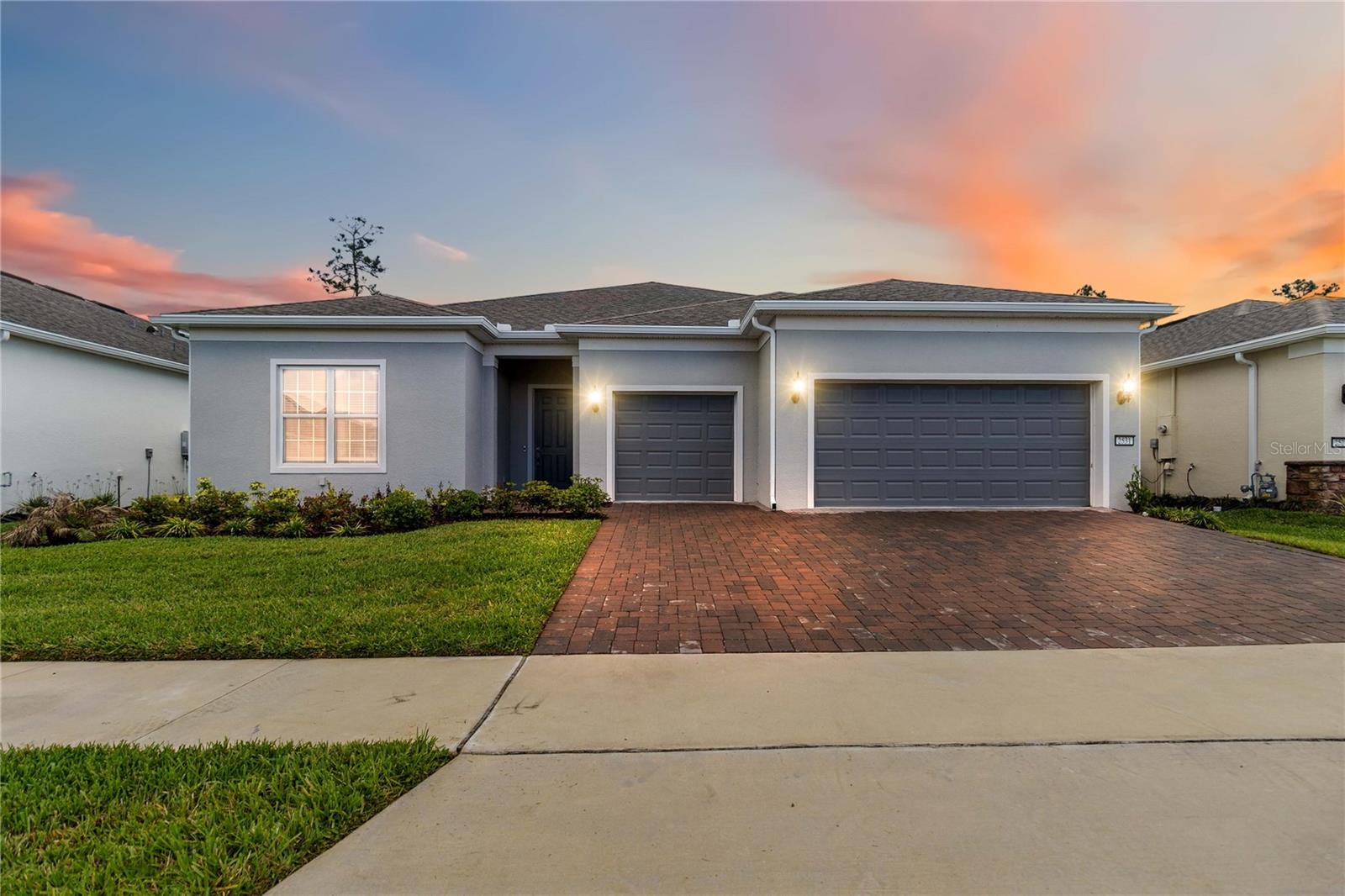 Welcome to the Renown Model in the highly sought after 55+ community of Del Webb at Sunbridge.  It's a stunning four-bedroom, three and a half bath home featuring a versatile three-way split floor plan and a spacious three-car garage with a large driveway. As you enter, you’re welcomed by an oversized foyer with high ceilings and rich wood floors throughout the main areas. The home is adorned with upscale lighting and ceiling fans in every room. The gourmet kitchen boasts 42-inch white cabinets, quartz countertops, gas appliances, and a built-in microwave and oven combination, along with a butler’s pantry and a full walk-in pantry. The master suite offers a serene view of a private conservation area, a spacious walk-in closet, and a luxurious bath with a super shower and upgraded fixtures. Each bedroom has its own ensuite bath, and an additional flex room can serve as an office or study. Outside, the extended, screened patio overlooks the conservation and is pre-plumbed for an outdoor kitchen and room for a pool—an ideal retreat for both everyday living and entertaining.

Enjoy an unmatched resort-style lifestyle centered around the impressive 27,000-square-foot clubhouse, with activities and events coordinated by a full-time Lifestyle Director. Community amenities include a zero-entry pool with lap lanes, resistance pool, heated spa, tennis and pickleball courts, fitness center, movement studio, fire pits, grille pavilion, and an on-site tavern and grille. For added convenience, exterior yard maintenance and internet are included, and the community's fiber network provides internet speeds up to one gigabit. Ideally located just south of Lake Nona and near Lake Nona Medical City, NeoCity, shopping, dining, and entertainment, this 24-hour man-gated community offers quick and easy access to SR 417 and SR 528.