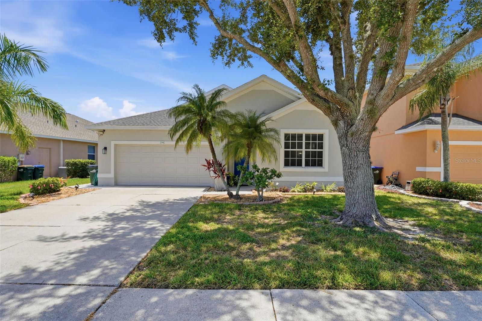 Thoughtful updates, a private preserve backdrop, and a spacious floor plan make this home a standout opportunity in Lakeside Plantation. Offering 1,925 square feet under air, this meticulously maintained home delivers the space buyers want with the low-maintenance lifestyle they appreciate. Step through the front door and you'll immediately notice the fresh interior paint, abundant natural light, and luxury vinyl plank flooring that flows throughout the home. With no carpet anywhere, maintenance is simple and the look is both beautiful and timeless. At the center of the home is a beautifully updated kitchen that opens directly to the living room, creating a spacious and inviting central living area. A massive counter-height island showcases stunning granite countertops and provides plenty of seating for family and guests. Complementing the island are contrasting Corian countertops, a pantry for additional storage, and an eye-catching tile backsplash that adds character and warmth to the space. Sliding glass doors lead to the screened lanai where you can enjoy your morning coffee, unwind after a long day, or simply take in the tranquil wooded preserve view. Because the preserve is protected from future development, you'll continue to enjoy a sense of privacy that is becoming increasingly difficult to find. Designed with both comfort and functionality in mind, the primary suite features a tray ceiling, two walk-in closets including one with custom shelving, drawers, and organizers, a beautifully appointed bathroom with dual vanities and a large walk-in shower. The split-bedroom layout creates separation between the primary suite and guest bedrooms. Two generously sized guest bedrooms and a full bathroom offer comfortable accommodations for overnight guests, a home office, or hobby space. Valuable updates have already been completed, including a NEW ROOF and HVAC system in 2023, helping to reduce future maintenance concerns. This home is NOT LOCATED IN A FLOOD ZONE and HURRICANE SHUTTERS are included for added peace of mind. The home is connected to CITY WATER AND SEWER, plus NATURAL GAS is available for future connection. The low HOA fee of just $286 per quarter INCLUDES LAWN CARE, making it easy to lock up and travel with confidence or simply spend less time on maintenance and more time enjoying the Florida lifestyle. Whether you're searching for a year-round residence or a seasonal escape, this property offers an easy-care lifestyle without sacrificing living space. Residents of Lakeside Plantation enjoy access to outstanding amenities, including a clubhouse, community pool and spa, fitness center, tennis and pickleball courts, playground, library, and a full calendar of social activities. Known for its friendly atmosphere and active lifestyle, Lakeside Plantation continues to be one of North Port's most sought-after communities. Conveniently located near shopping, dining, medical facilities, golf courses, parks, and Gulf Coast beaches, this home offers the lifestyle so many buyers are searching for.