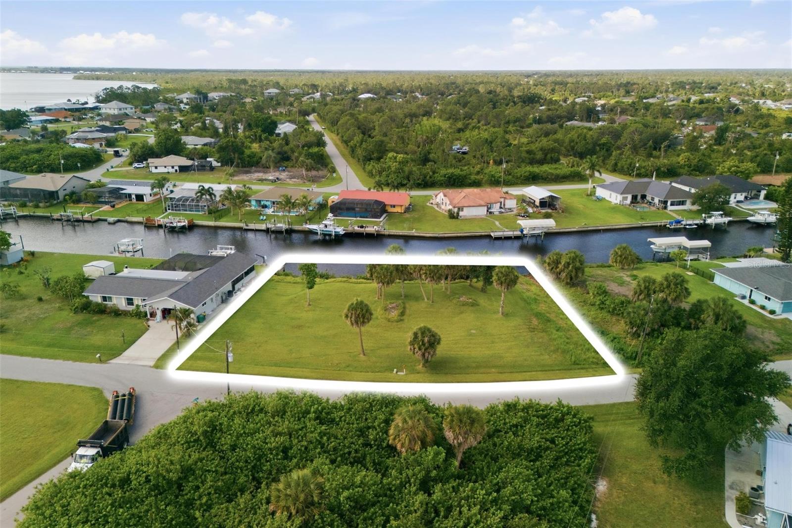 Paradise Awaits....Time to Start Planning your Florida Dream Home on this Double Waterfront Lot in one of the most sought after Waterfront Communities in Port Charlotte..... Gulf Cove is a peaceful residential community with optional HOA.  If you choose to participate, a low yearly fee grants you permission to use the private boat ramp and private community park.
This property offers 160 sf of waterfront access out to the Myakka River to the Gulf of America...Nearby water, sewer and electric....
Plenty to do in the area including:  Boating & Fishing, Nature & Biking, Beach Hopping & Sunsets, Golfing, Dining & Local Events and more...Nearby beaches as close as 20 minutes away....
Time to Enjoy the Florida Lifestyle!!  Build your Dream Home Now!!  Plenty of local builders to help plan your New Florida Home...Call today...