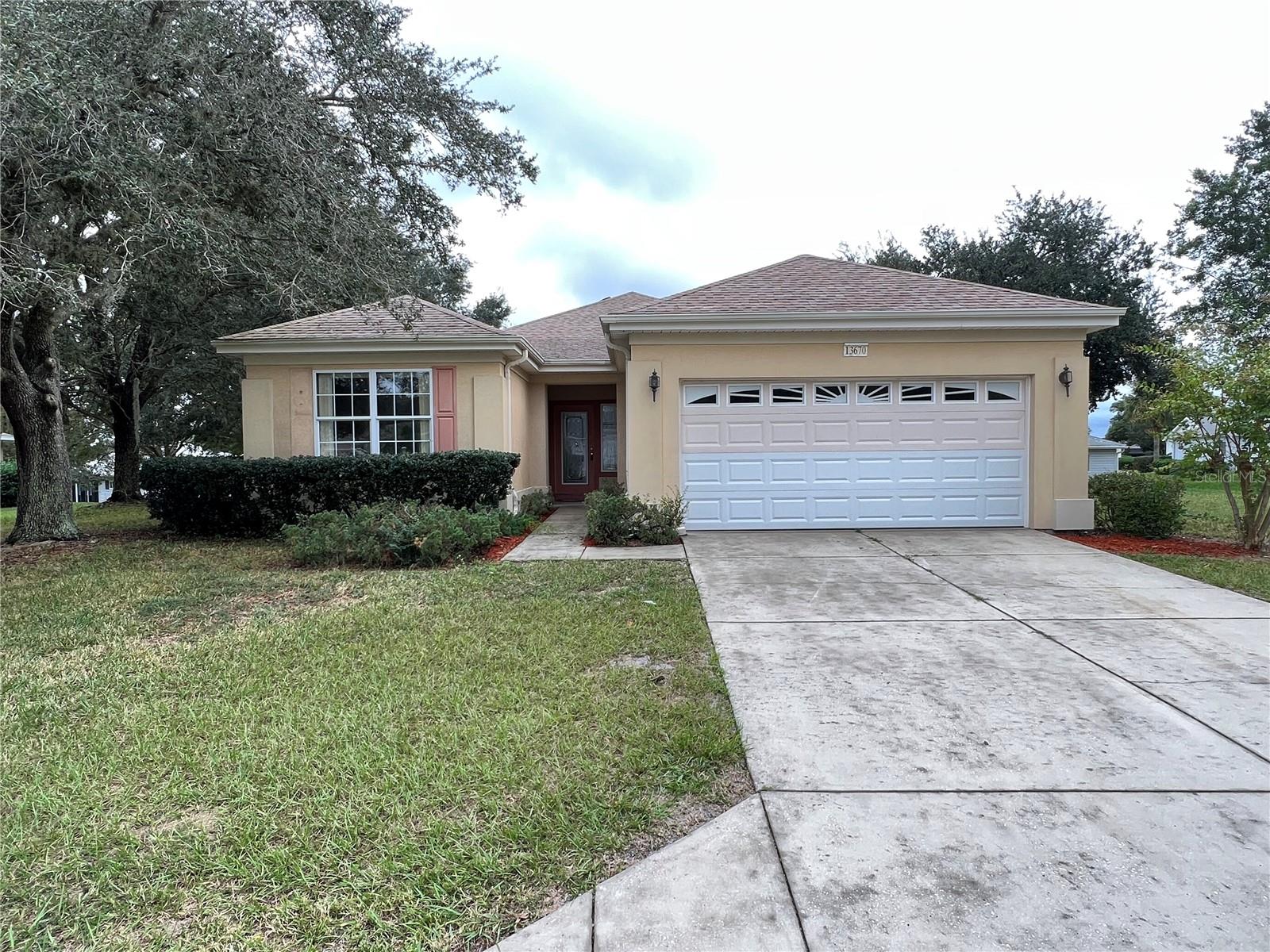 If you're looking for a budget friendly rental near the Villages, this is it! Spacious unfurnished 2 bedroom, 2 bathroom plus office Ponte Vedra model home in the fantastic 55+ Gated Community of Del Webb Spruce Creek Golf and Country Club. Great location just a short distance to the Horizon Center, indoor and outdoor pools, workout center, Liberty Grill, and the Golf Course. *1 Small Pet Possible with Owner Approval. Pet fee $250 *Breed Restrictions Apply.* Enclosed lanai. Neighborhood is conveniently located between The Villages and Ocala. Prefer long term tenant. No refrigerator. Tenant pays their own utilities, and this is a non-smoking unit.