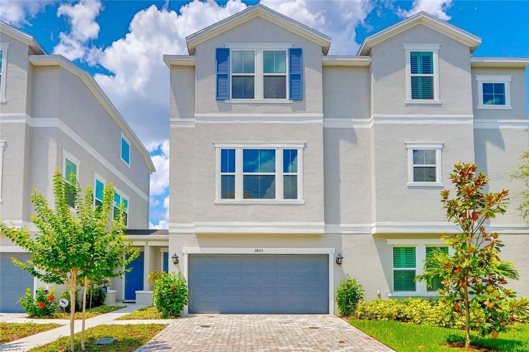 Luxury townhome centrally located in South Tampa location. Small 5 home community, all end units, all with private fenced in back outdoor space. Grady, Coleman and Plant School Districts!! Meticulously maintained 3BR/3.5BA David Weekley Townhome. As you enter the foyer you have a welcoming view of the private backyard with your own pavered lanai and artificial grass. The first floor has a bedroom and full bath with shower. As you go up to the second floor, you will have your main living space with crisp white kitchen 42” soft-close cabinets, quartz counters and stainless steel appliances including a gas range and refrigerator! The Chef’s kitchen overlooks the dining and family room. Very light and bright open space, with the warm wood floors and rustic pendant lighting. All the windows will have wooden shutters. There’s a huge pantry and a powder bath.  Perfect for entertaining! On the third floor, you will have the master bedroom suite with not one but two walk in closets double sinks! Frameless shower door encloses the shower with beautiful gray wall tile to the ceiling! An additional bedroom with it's own bath is at the other end of the home to allow for privacy and has en suite bathroom with a tub. This home has a zoned AC allowing for each floor to have it's own thermostat! Gas tankless water heater and impact glass windows are just some of the upgrades not found in other town homes. Owner has done all the closets to California style and put wooden shutters on all the windows!! There is water softner and monitored security system installed. Unbeatable Location- walk to Midtown, Trader Joe’s & LA Fitness, minutes to Hyde Park, Downtown, TIA, MacDill AFB & Bayshore. Make this your home!!!