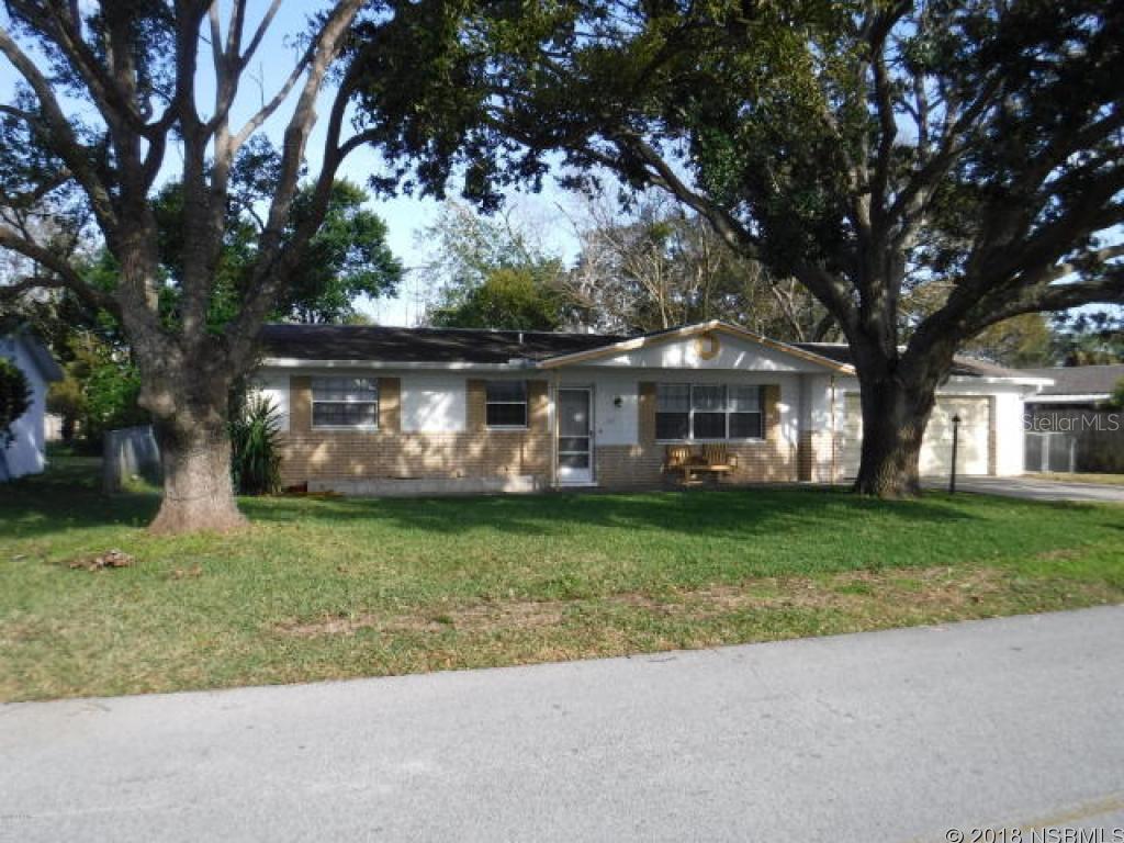 Wonderful block single family home with fenced yard and a 2 car garage! The two large bedrooms are nice, there is an open kitchen and don't forget the two full baths. There is an enclosed Florida room out back providing extra space and the front covered porch is a plus! The garage is large and there is a well for the irrigation of the lawn. Outside storage shed for the extra space we all need. You will be surrounded by great neighbors where pride in ownership shows! The master bath has been updated and there is a large outside patio with room for grill and table set. $1,000 carpet allowance WITH GOOD CONTRACT.