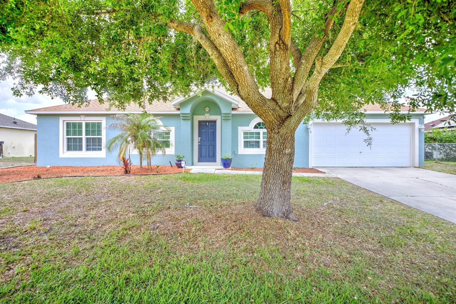 This spacious 4-bedroom, 2-bathroom home offers over 2,000 square feet of living space with a practical split floor plan. Enjoy a bright, open feel with a family room that flows into the adjoining kitchen, ideal for entertaining. The kitchen features abundant wood-grain cabinets, a spacious island with a prep sink, and two pantries for ample storage. The master suite includes two separate walk-in closets and a bath with both a tub and a walk-in shower.

Updates include a new roof (2023), vinyl plank flooring (2021), window replacements (Oct 2022), A/C and air purifier (2023). Outside, you’ll find a screened rear porch and a fenced backyard, plus a 2-car garage.

Located in the Sun N Lake community, residents enjoy nearby amenities, including a community pool, championship golf courses, tennis courts, a playground, and an on-site restaurant. Medical facilities are minutes away, and multiple amenities are within easy reach.