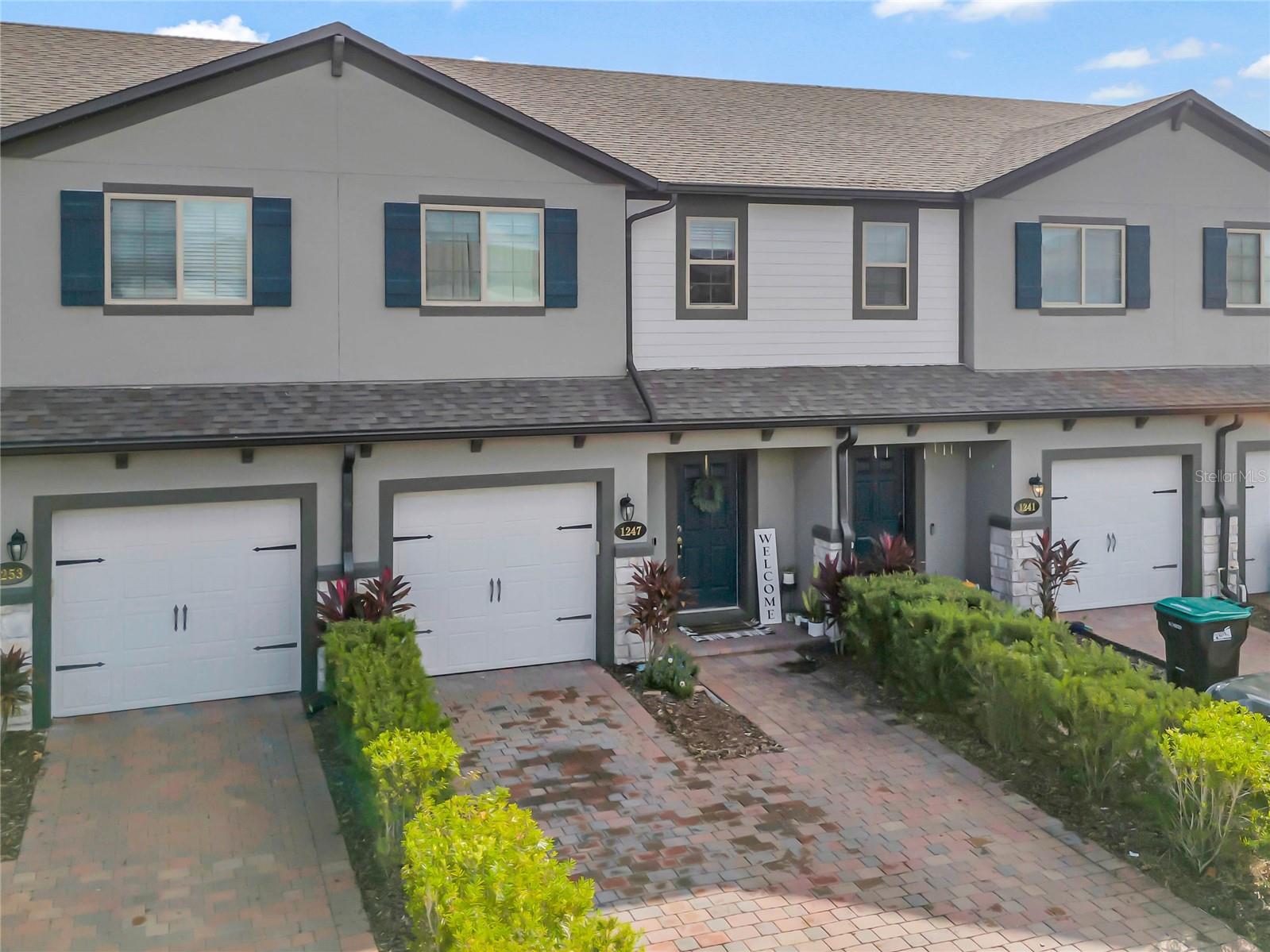 Back on the Market - Experience the balance of modern living, convenience, and community of 1247 Flowing Tide Drive in the Towns at Avalon Ridge community. This townhome, built in 2019, offers 1,451 square feet of spacious living area, including three bedrooms, two and a half bathrooms, a loft area, a screened patio, and a one-car garage. 

Upon entering, you'll be greeted by a sunlit open floor plan that flows seamlessly from the foyer to the living and dining areas, making it an ideal space for entertaining. The gourmet kitchen is a chef's dream, equipped with state-of-the-art stainless steel appliances, granite countertops, and a spacious island perfect for gatherings. Open the sliding glass doors to reveal a private screened patio where you can relax in the Florida sun or enjoy pest-free outdoor dining.

Back inside, the second floor features a luxurious primary suite with a spacious walk-in closet and an ensuite bathroom with dual sinks and a contemporary shower. You'll also find two additional well-appointed bedrooms upstairs that share a full bathroom with a relaxing tub. The laundry room is conveniently located on the same level for added ease. The second floor also offers a small loft area that can be used as a quiet reading nook, study area, or a small play area.

Other notable features of this home include a one-car garage, energy-efficient windows, cutting-edge smart thermostat, a prime location with easy access to major highways 408, 528, and 417, Avalon Park, Waterford Lakes, UCF, and a variety of shopping, dining, and entertainment options.

The Towns at Avalon Ridge community offers amenities that prioritize your lifestyle, including a refreshing pool, ample guest parking, a playground, and a dog park for leisurely walks with your furry friend. Don't miss the opportunity to experience the best of Orlando living in this vibrant neighborhood. Schedule your showing today and envision your future at 1247 Flowing Tide Drive!