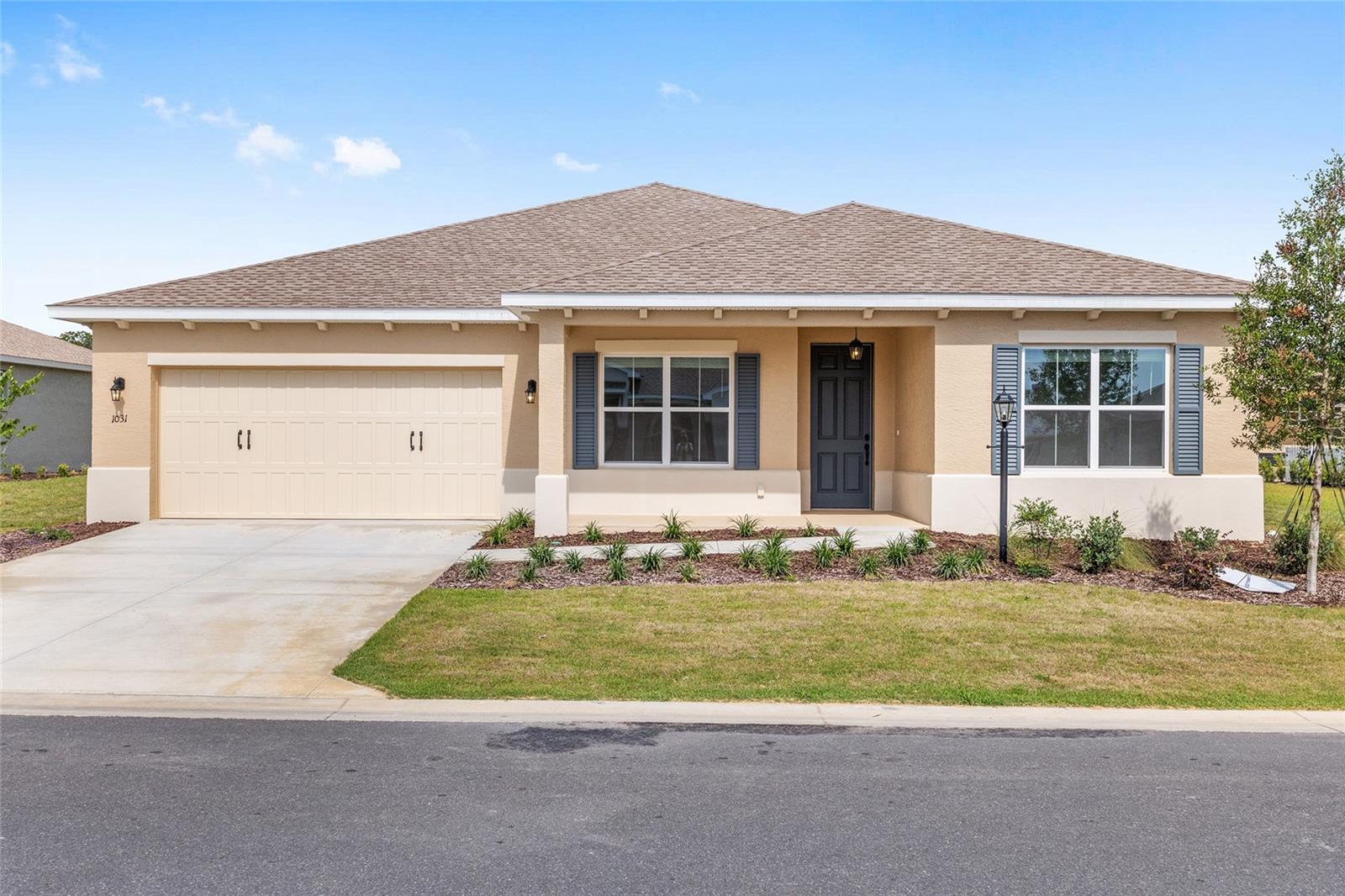 Welcome to the Ariana, a beautifully appointed new construction home in Longleaf Ridge at On Top of the World, where thoughtful design meets modern comfort. Featuring 2 bedrooms, 2 bathrooms, and a 2-car garage with dedicated golf cart space, this home offers the perfect blend of style and functionality.

The open-concept layout is designed to make everyday living effortless, with a spacious great room that flows seamlessly into the kitchen and dining area. The well-appointed kitchen is sure to impress with its built-in ovens, timeless subway tile backsplash, abundant cabinetry, and ample workspace for cooking and entertaining.

A private flex room with elegant French doors offers endless possibilities as a home office, library, hobby room, or media space, providing both versatility and privacy. The owner's suite is a relaxing retreat with a spacious en-suite bath and generous closet space, while the second bedroom and full bath create a comfortable space for overnight guests.

A dedicated laundry suite adds everyday convenience, and the quality craftsmanship of this brand-new home provides peace of mind for years to come. Located in the sought-after Longleaf Ridge neighborhood, you'll enjoy all the exceptional amenities, recreation, and vibrant golf cart lifestyle that make On Top of the World one of Ocala's premier active-adult communities.