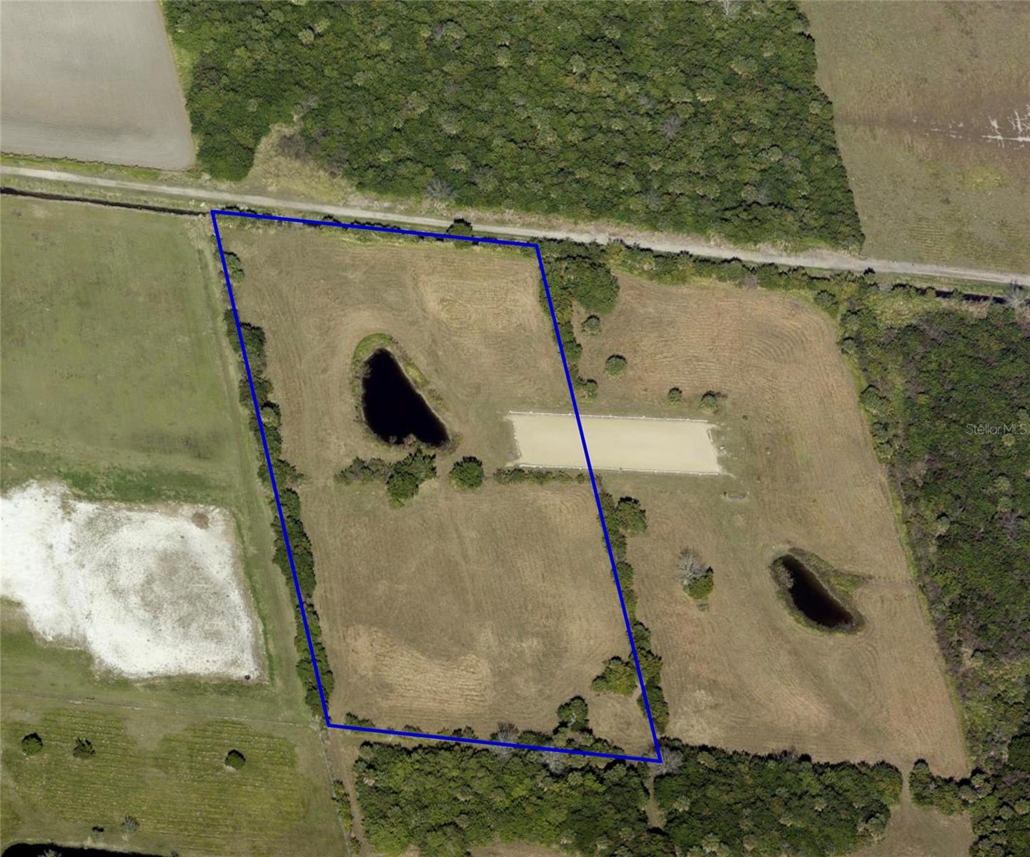 Bring your plans and discover the possibilities offered by this improved 5.31-acre property! Several valuable features are already in place, including partial fencing, a private well, underground power, and a culvert with a gated entrance. Whether you envision a custom homesite, private country retreat, recreational property, workshop or space for animals, this parcel provides an excellent foundation for your plans. Enjoy privacy, room to spread out and the peaceful rural lifestyle North Brevard is known for, while remaining within convenient reach of Mims, Titusville, major roadways and the surrounding Space Coast. Properties with acreage and existing improvements like these can be difficult to find. Buyer to independently verify zoning, permitted uses, buildability, access, well condition, electrical service, fencing, wetlands, environmental conditions and all development requirements. Two additional 10 Acre Tracts Available & an additional 5 Acre Tract is available too. Owner is LREA