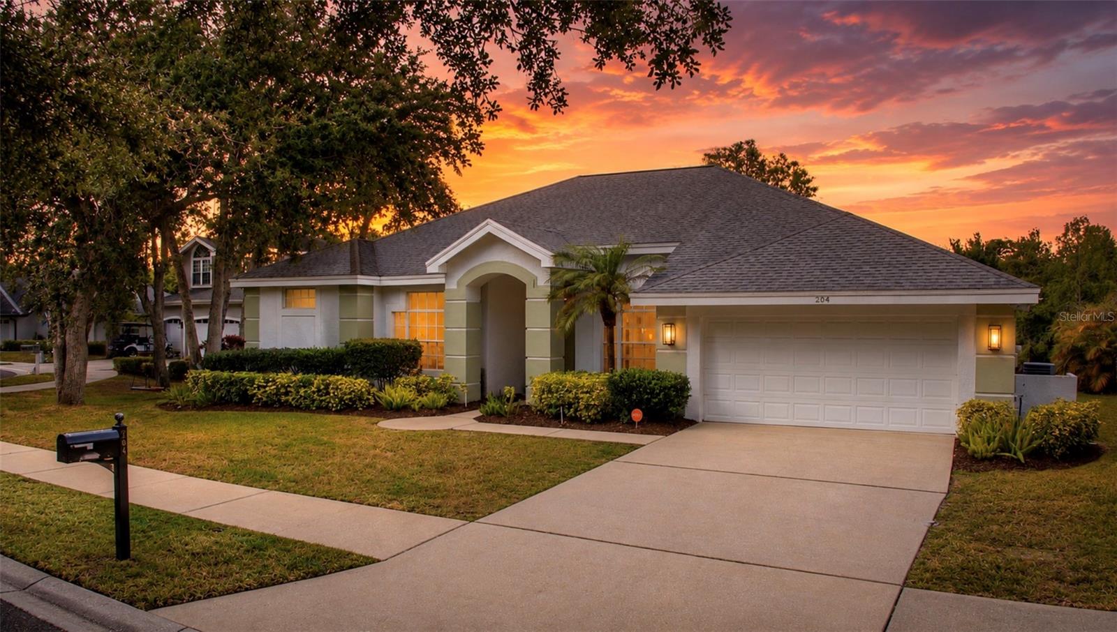 Welcome to a beautifully reimagined home in the highly sought-after La Forest at Green Springs, tucked away on a quiet cul-de-sac in Safety Harbor. Offering 2,446 square feet of thoughtfully designed living space, this fully updated residence combines modern luxury with serene natural surroundings.
From the moment you enter, you’re greeted by soaring ceilings, abundant natural light, and an open-concept layout designed for both everyday living and entertaining. The home’s panoramic windows frame breathtaking, unobstructed pond views—where tranquil water meets lush forest beyond, with no rear neighbors in sight. Enjoy watching local wildlife from the comfort of your living room next to the sleek grand scale electric fireplace or on the expansive lanai.
Completely updated in 2024, the chef’s kitchen is a true centerpiece, featuring premium KitchenAid appliances, soft-close cabinetry, extensive storage, and two oversized waterfall islands that offer both function and striking design. The open flow seamlessly connects the kitchen to the main living areas, all oriented to maximize the stunning water views.
A desirable split floorplan provides privacy, with the primary suite tucked away on its own wing. The spa-inspired primary bathroom showcases a waterfall shower, soaking tub with chandelier overhead, double-sink vanity with built-in cabinet outlets, and a bidet—creating a true retreat experience. Secondary bedrooms are located on the opposite side of the home, along with a versatile fourth bedroom ideal for a home office or flex space.
Additional interior features include custom closets throughout, remote-controlled Selex blackout/sheer blinds, a whole-house reverse osmosis water system, brand new washer and dryer, and enhanced security with glass-break and motion sensors.
Outdoor living is equally impressive, with an approximately 800 sq ft lanai designed for relaxation and entertaining. The freshly painted and sealed patio features remote-controlled fans and offers the perfect setting to enjoy the peaceful water and preserve views year-round.
Located just minutes from charming downtown Safety Harbor, residents enjoy easy access to local dining, waterfront parks, walking trails, and community events, all while being conveniently positioned between Tampa and the Gulf beaches.
This is a rare opportunity to own a fully updated, move-in ready home with unmatched views in one of Safety Harbor’s most desirable neighborhoods.