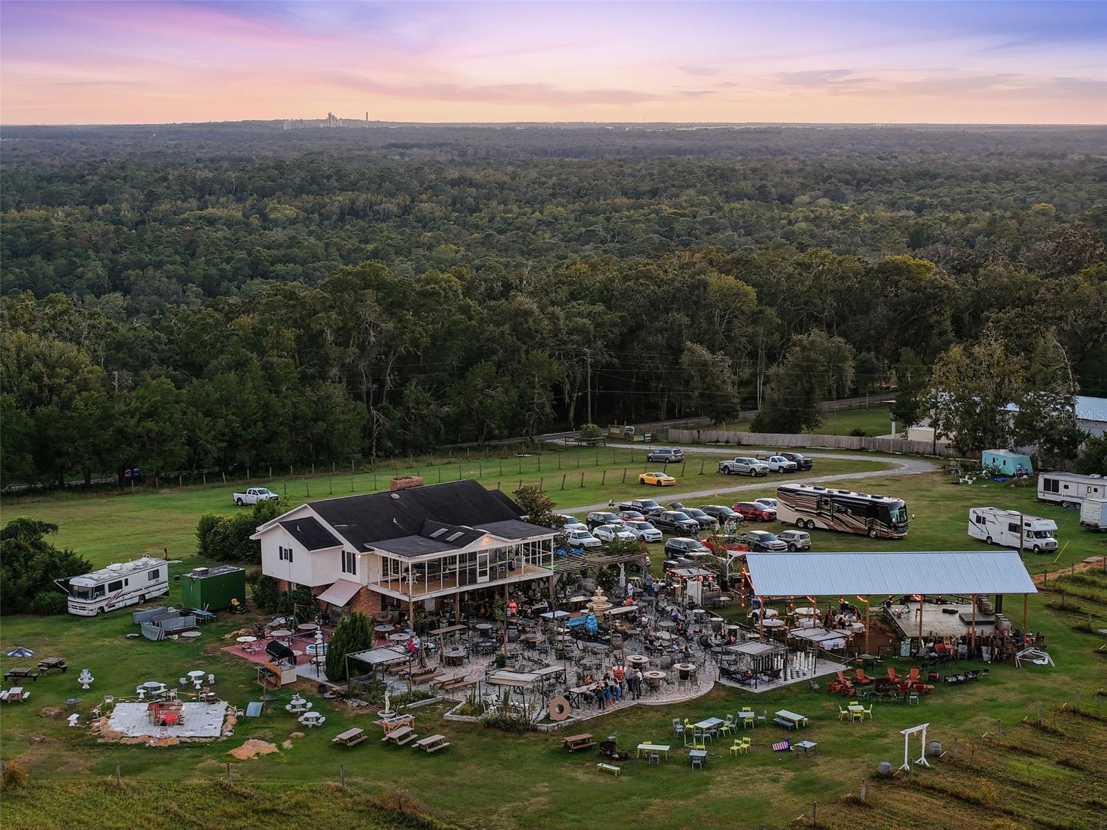 Discover an extraordinary opportunity to own a thriving winery, entertainment venue, and private residence—all perched atop one of the highest hills in the region. Welcome to Sparacia Witherell Family Winery & Vineyards, a breathtaking 28-acre estate in historic Brooksville, set at an impressive 275 feet above sea level—one of Florida’s highest elevations.

This income-producing property features a spacious two-story wine bar and tasting room, complete with beautifully appointed owner’s quarters upstairs. Whether you’re seeking a turnkey business or envision expanding into a premier destination winery, the possibilities are endless.

The venue is already a popular hub for community and private events, including live music concerts, weddings, comedy nights, reunions, and a wide array of celebrations. With its sweeping vistas, inviting atmosphere, and established customer base, this property offers the foundation to create a destination experience reminiscent of the renowned wineries of the North Georgia Mountains—where guests come for the wine, stay for the food and views, and return for the unforgettable experience.

Schedule your private tour today to explore the full potential of this remarkable property and imagine what you can create here.