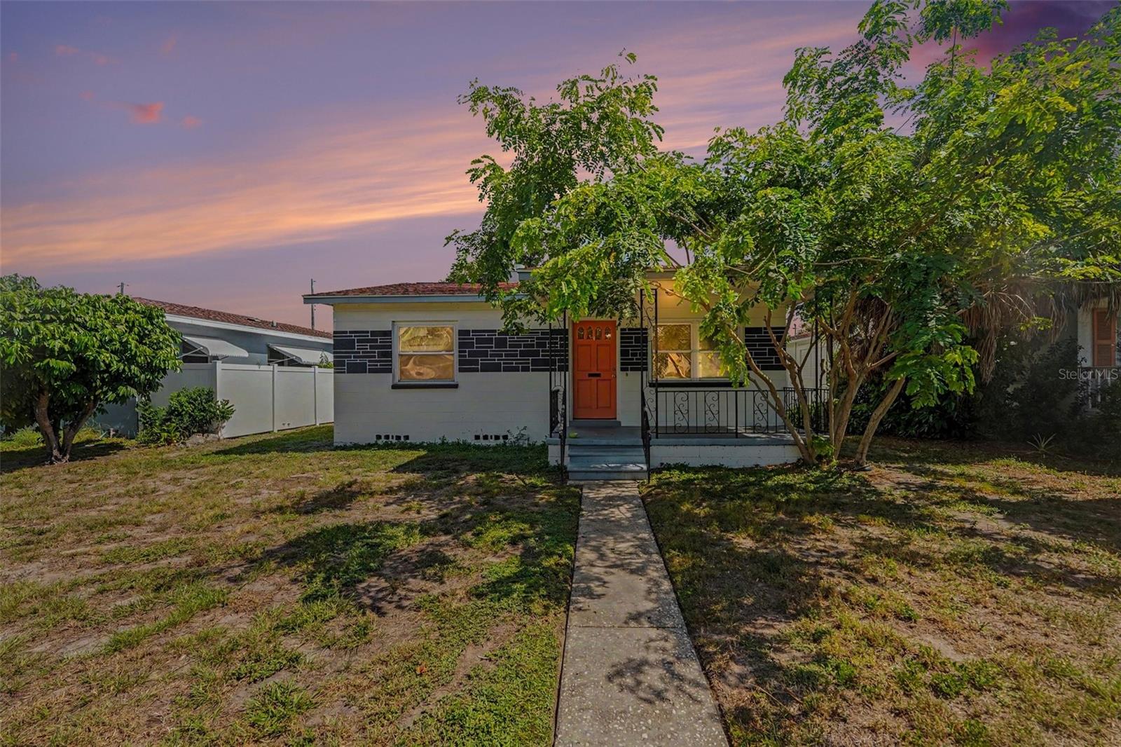 Charming and move-in ready in the heart of St. Pete, just steps outside the highly desirable Historic Kenwood neighborhood! This 2-bedroom, 1-bath bungalow blends classic character with all the right modern updates, offering a rare opportunity to own in one of the city's most sought-after pockets at an incredible price point.

Step inside to find a bright, freshly painted interior that feels clean, crisp, and ready for its next owner. The updated kitchen is perfect for everyday living and entertaining, while newer windows (2018) fill the home with natural light and add energy efficiency. Peace of mind comes standard with a newer HVAC system (2019) and a brand new water heater.

The layout lives larger than the square footage suggests, with a comfortable flow from the living area into the kitchen, plus a private back patio that is ideal for morning coffee, weekend grilling, or unwinding after a long day.

Location is everything here. You are minutes from the vibrant shops, restaurants, and art scene of Downtown St. Pete, Grand Central District, and Central Avenue. Enjoy easy access to I-275, the Gulf beaches, and Tampa International Airport, plus the walkable charm and community feel of the surrounding Kenwood area.

Whether you are a first-time buyer, savvy investor, or looking to downsize into something easy and turnkey, this home checks every box. Homes in this location, at this price, and in this condition do not last. Schedule your private showing today!