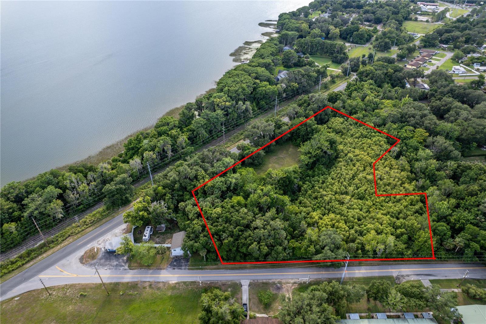 Prime 2.08± acre commercial opportunity in Lake County’s growing Golden Triangle area. Featuring frontage on both County Rd 452 and N CR 19A, this high-visibility parcel offers excellent access and development potential near Lake Eustis. Public water and sewer available. Ideal for retail, office, or mixed use concepts, subject to county approval. Convenient access to SR 44, US Hwy 441, downtown Eustis, and Mount Dora. Buyer to verify zoning and development possibilities.