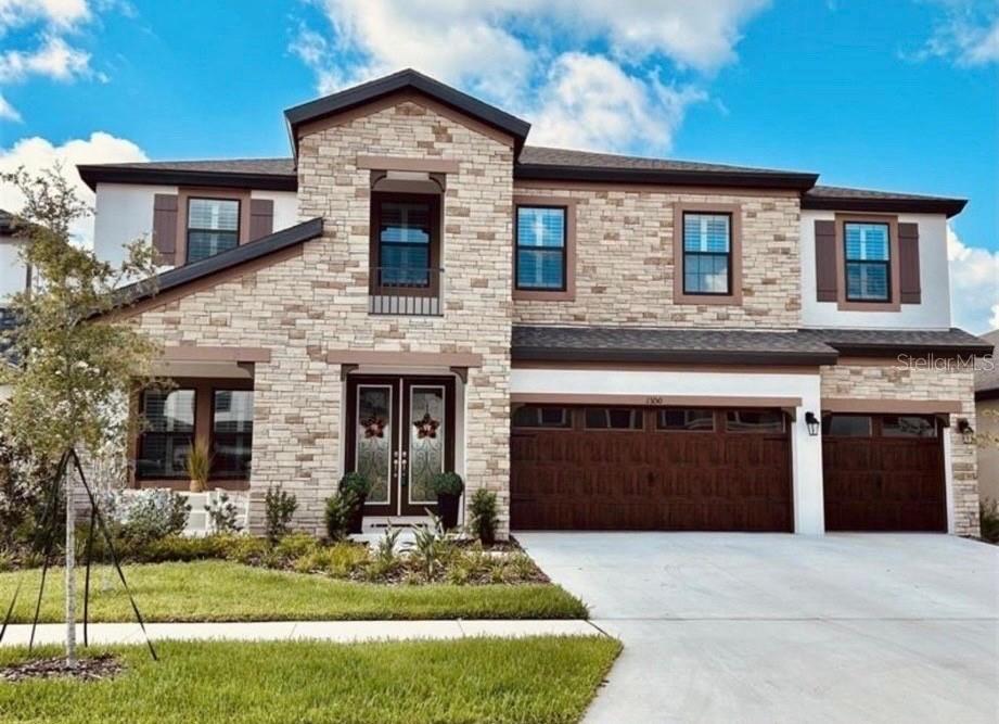 Discover this exceptional, nearly new residence offering 3,606 square feet of refined living space, featuring 5 bedrooms, a private den/office, an expansive bonus room, and 4 full bathrooms. Designed with elegance and functionality in mind, the expansive open-concept floor plan showcases Kinsdale Maple Slate cabinetry, Frost White MSI quartz countertops, and Prominence Plus Executive Oak luxury vinyl plank flooring throughout the main living areas. Seamless indoor-outdoor living is achieved through an oversized NEW screened lanai, effortlessly connecting the great room, gourmet kitchen, and bright breakfast area—ideal for entertaining or everyday enjoyment. The first floor includes a dedicated den or office, perfect for remote work, along with a private guest suite and bath, offering comfort and privacy for visitors. Upstairs, you’ll find generously sized secondary bedrooms with walk-in closets, a large bonus room, a conveniently located laundry room, and a luxurious owner’s retreat featuring an oversized walk-in closet and a spacious, spa-inspired bathroom. Located within the master-planned Hawkstone community, residents enjoy resort-style amenities while remaining close to top-rated Lithia schools, scenic nature preserves, family-friendly attractions, and convenient access to US-301 and I-75. Outdoor enthusiasts will appreciate the pet-friendly hiking trails of the 969-acre Triple Creek Nature Preserve, just under two miles away, as well as Triple Creek BMX, located only one mile south of Hawkstone.