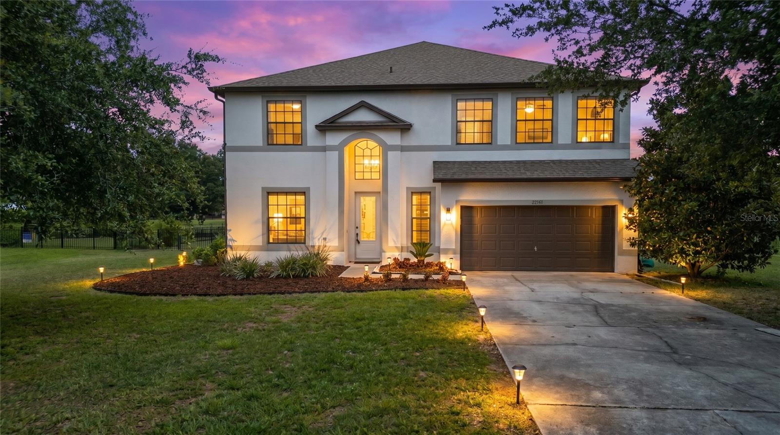 HGTV ready and thoughtfully UPGRADED, this massive 5 bedroom + BONUS ROOM estate offers over 3,600 square feet of living space on more than three-quarters of an acre, FULLY FENCED, in the highly desirable community of Black Bear Reserve.
From the moment you walk through the custom 8-foot entry door, you’ll notice the attention to detail with T&G shiplap walls and porcelain tile flooring gracefully flowing throughout the entire first floor! The sellers spared no expense and have invested over $55k in upgrades even down to Pismo Round door hardware!
Designed with both function and lifestyle in mind, the home features a reimagined layout including an oversized laundry room with ample storage and prep space, along with a beautifully finished mudroom just off the garage to keep everything organized. The chef inspired kitchen boasts 42” cabinetry, granite countertops, stainless steel appliances, and a large island that opens seamlessly to the main living areas, perfect for everyday living and entertaining. A standout feature is the custom walk-in pantry, offering a full 10-foot wall of open shelving, upper cabinetry, and additional lower storage with a butcher block countertop, storage will never be an issue here!!
The primary suite is conveniently located on the main floor and offers generous space, natural light, and a 36” K-Bar Solid Core Barn Door that leads into the spa-like en suite with a designer-inspired shower, elegant vanity, and a walk-in closet with shelving and hanging space. NEW HVAC (2025), NEWER ROOF (2021), NEWER Interior/Exterior Paint. 
Upstairs, you’ll find even more flexibility with a MASSIVE bonus room, ideal for a second living area, home theater, or playroom, there are endless possibilities! There is also a second primary suite featuring its own private bath and walk-in closet, which could make for an ideal MOTHER-IN-LAW Suite. The additional bedrooms are all generously sized, giving everyone their own space.
Step outside to your oversized covered porch overlooking the expansive, FULLY FENCED backyard, plenty of room to create your own outdoor oasis. Come see this majestic home before it is too late!! 
Black Bear Reserve offers a unique blend of space and convenience, including high-speed internet and cable with your dues! There is also a clubhouse, tennis courts, playground, picnic area, and a floating dock. Oh and did I mention, they have a Toptracer Range powered by the same technology used at Topgolf, offering a fun, interactive driving range experience without the high price tag!! Tucked away with a peaceful, country feel, yet just minutes from Publix and the 429 for easy access to everything Central Florida has to offer.
ADDED BONUS! This home may qualify for an ASSUMABLE MORTGAGE at an attractive 4.125% interest rate, offering potential savings for qualified buyers. 
This is a home with space, flexibility, and upgrades in all the right places, schedule your private showing TODAY!