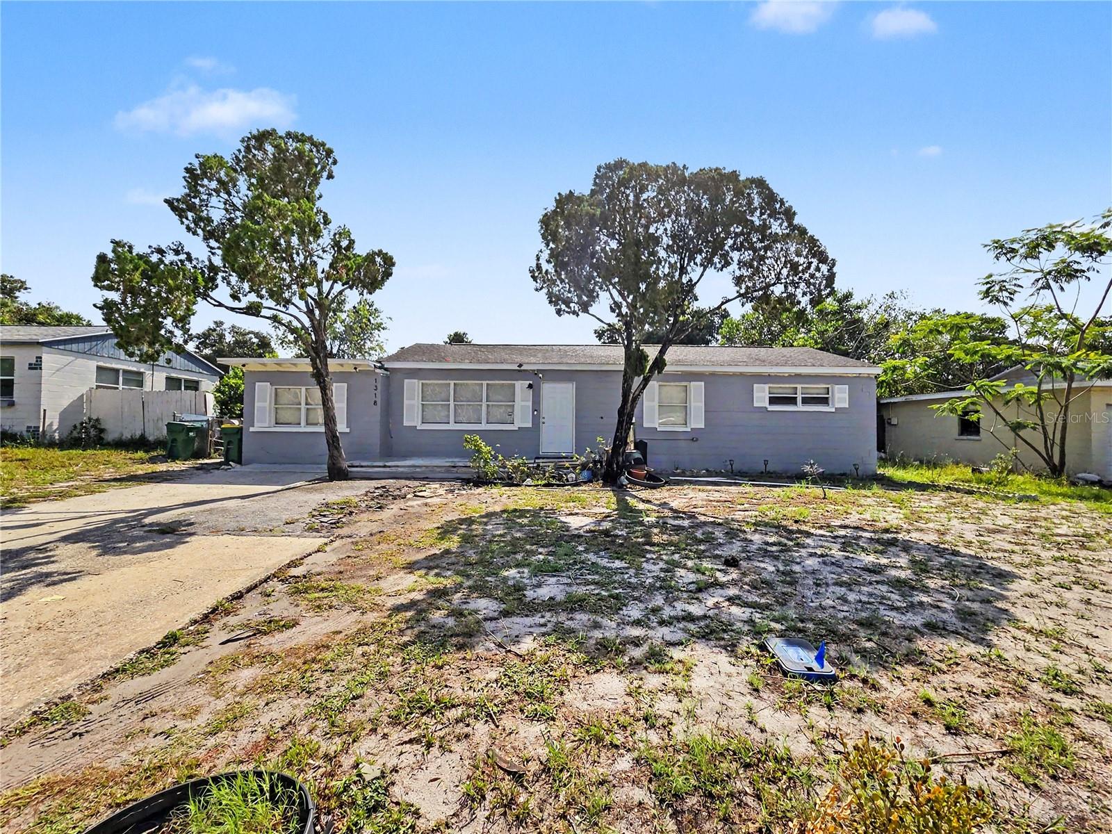 Completely Renovated & Move In Ready! Welcome to this beautifully updated 3-bedroom, 1.5-bath home featuring a versatile floor plan that can easily accommodate a 4th bedroom, home office, or flex space to fit your lifestyle. Situated on an oversized 75' x 212' lot, this property offers abundant indoor and outdoor living space. The remodeled kitchen showcases granite countertops, real wood cabinetry, and stainless steel appliances, creating the perfect space for cooking and entertaining. Enjoy the durability and style of tile and wood laminate flooring throughout, offering both comfort and easy maintenance. Step outside to a spacious, fully fenced backyard with mature trees that provide shade and privacy, plus plenty of room for pets, outdoor gatherings, or even your future dream pool. Ideally located just a short drive from Cocoa Beach, and close to shopping, dining, schools, parks, and major highways, this home offers the perfect blend of comfort, convenience, and Florida living. Whether you're a first-time homebuyer, downsizing, or looking for an investment opportunity, this move-in-ready home is one you won't want to miss. Schedule your private showing today!