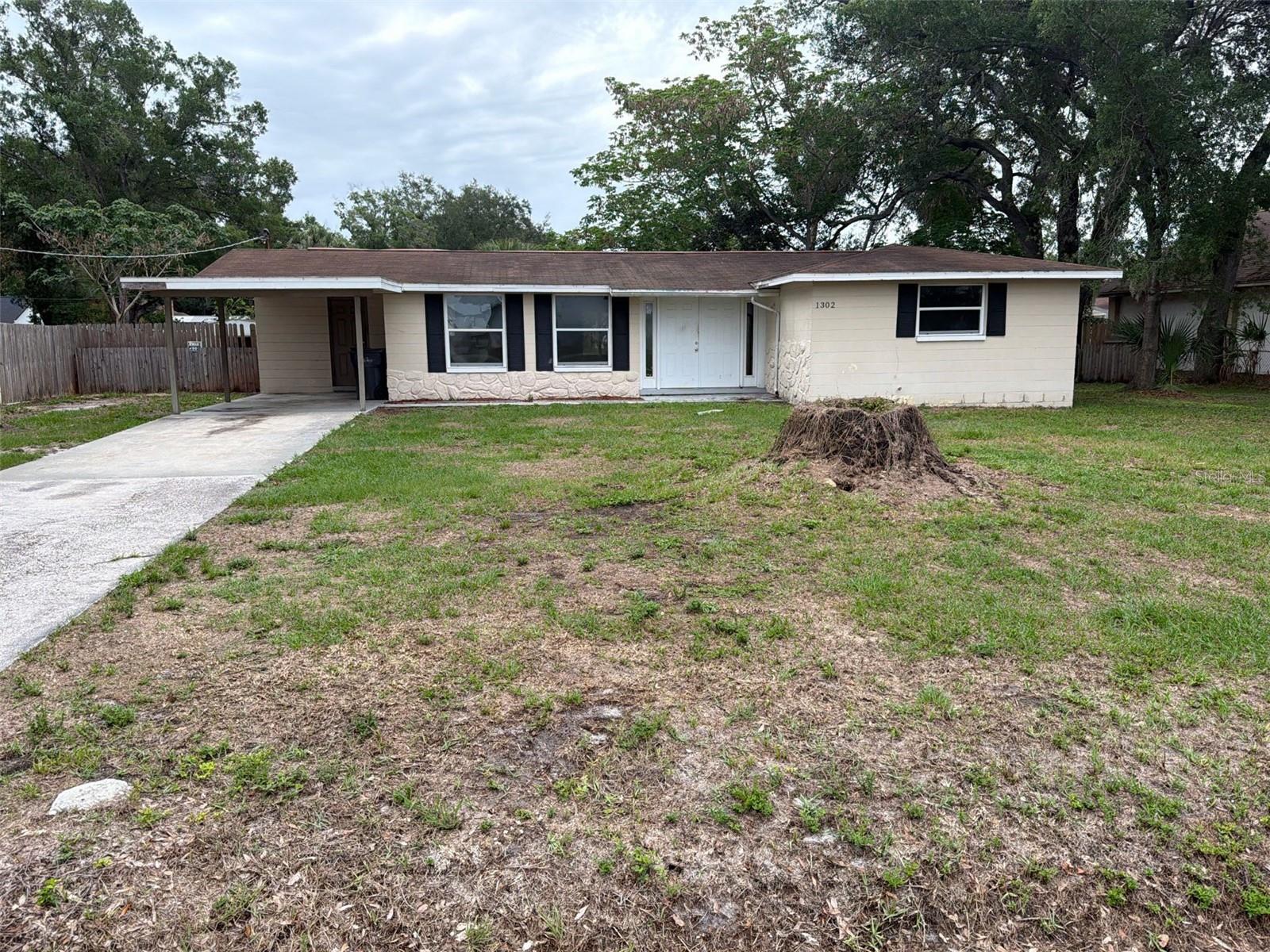 This property is a fixer-upper in need of some TLC. Offering 3 bedrooms and 2 bathrooms, this home is located in the Palm River Estates neighborhood. Inside, the home features a classic traditional floor plan that offers a comfortable and functional flow from room to room. The kitchen is equipped with functional appliances and durable Formica countertops. The primary bedroom provides excellent storage with a large walk-in closet. Step outside to enjoy the privacy of a fully fenced-in backyard, offering a great space for outdoor relaxation and activities. Conveniently situated within the area, this home is located just moments away from a local elementary school, a neighborhood pizzeria, and much more. Schedule your private showing today!