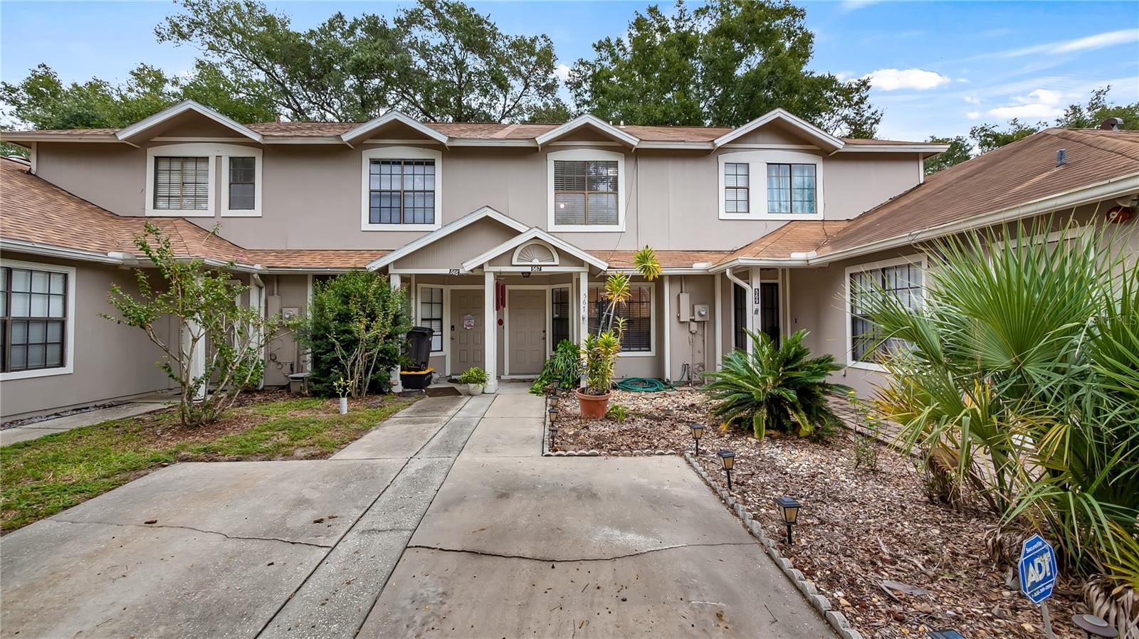 Welcome to this charming two-story townhome with a cozy two-bedroom layout. Upon entering the home you are greeted by a well-defined foyer that provides access to the upstairs. When you turn to the right, you'll step into the open and inviting living room and dining room combo, both graced by beautiful laminate floors. If you continue through the living room and dining area, to the left, you'll discover the conveniently located guest half bathroom. Beyond that, you'll find the generously sized kitchen, adorned with timeless aesthetics, featuring tile elements that give it a classic sense of style. Within the kitchen, you'll find sliding glass doors that lead to the back, screened-in porch, offering a delightful outdoor escape. On the rear of the home is a storage closet. As you walk back through the kitchen there is a set of double doors that grants access to the laundry area, making chores more convenient. Additionally, the kitchen features a pantry for all your storage needs. Upon ascending the stairs, you'll arrive at the master bedroom which features a full-wall-length closet, in addition to an extra closet. LOTS OF STORAGE SPACE!! The master bedroom as well, boasts an en-suite bathroom that conveniently connects to the guest bedroom. Nestled between the two bedrooms, a common area features a second sink and ample counter space, adding functionality and practicality to the layout. This charming townhome is ideally situated in the heart of Altamonte Springs, offering convenient access to a plethora of essential amenities. Within just a 15-minute drive, you'll find a wide variety of furniture stores, grocery shops, and restaurants, ensuring that all your needs are easily met. Contact us today!