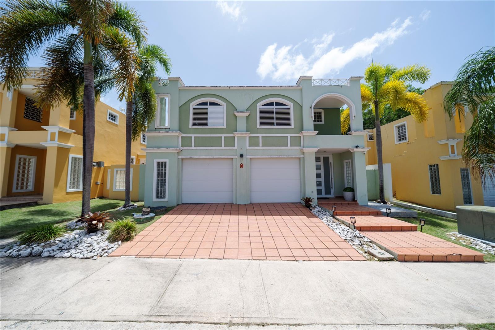 Two-story residence located in the exclusive Los Faroles community in Bayamón. This property offers approximately 2,500 square feet of living area on a 483-square-meter lot and features 4 bedrooms, 3.5 bathrooms, and a two-car garage. Every bedroom includes a walk-in closet, providing ample storage space throughout the home. The kitchen was remodeled in 2018 and features quartz countertops, with kitchen appliances included in the sale. Additional upgrades include an extended terrace completed in 2021, solar water heater, six inverter air conditioning units, and a solar energy system consisting of 17 panels and a battery. The community offers controlled access with 24/7 security, a swimming pool, playground, two basketball courts, and a future pickleball court. Monthly HOA fee is $153. An excellent opportunity to own a move-in-ready home in one of Bayamón's most desirable gated communities. Please call listing agent for more information and to schedule a private showing.