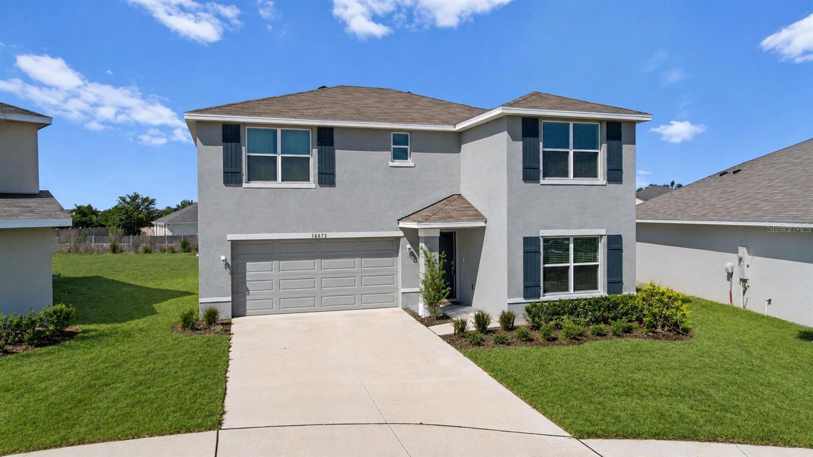Skip the construction delays, builder upgrades, and uncertainty of new construction—16673 Windmill Forge Pass is ready right now.

Built in 2023 and located behind the gates of Sereno, this 4-bedroom, 3-bathroom home offers 2,435 square feet of living space with a layout that simply works. Since purchasing the home, the owners have thoughtfully enhanced the property with a water filtration and softener system, upgraded kitchen lighting, and a custom kitchen backsplash that adds both character and style beyond the original builder finishes.

The main level features an open-concept design where the kitchen overlooks the living and dining areas, making it easy to stay connected whether you're entertaining guests or keeping an eye on the family. A first-floor bedroom and full bathroom provide flexibility for visiting guests, a home office, or multi-generational living.

Upstairs, the loft creates a second living space that's increasingly hard to find in today's homes. Whether you need a media room, playroom, workout space, or simply a place for everyone to spread out, this area gives you options. The spacious primary suite serves as a private retreat, while the additional bedrooms offer plenty of room for family and guests.

What makes Sereno particularly appealing is the lifestyle. Residents enjoy a gated entrance, resort-style pool, clubhouse, playground, dog park, and walking trails, all while being conveniently located between Tampa and Sarasota. Even better, the HOA fee is just $90 per month and includes internet service and cable TV—an exceptional value compared to many newer communities. Shopping, dining, healthcare, and everyday conveniences are just minutes away, and with easy access to US-301 and I-75, commuting throughout the Tampa Bay area is surprisingly convenient.

The surrounding area continues to attract buyers looking for more space, newer homes, and a growing list of amenities. Nearby Parrish has become one of Florida's fastest-growing communities, offering a blend of small-town charm and modern conveniences. Residents enjoy easy access to shopping, restaurants, golf courses, waterfront destinations, and some of Florida's most desirable Gulf Coast destinations.

Unlike many newer homes where buyers still need to budget for upgrades after closing, many of the finishing touches have already been completed here. For buyers looking for the benefits of newer construction without the wait, this home offers a chance to move right in and start enjoying everything this growing area has to offer.