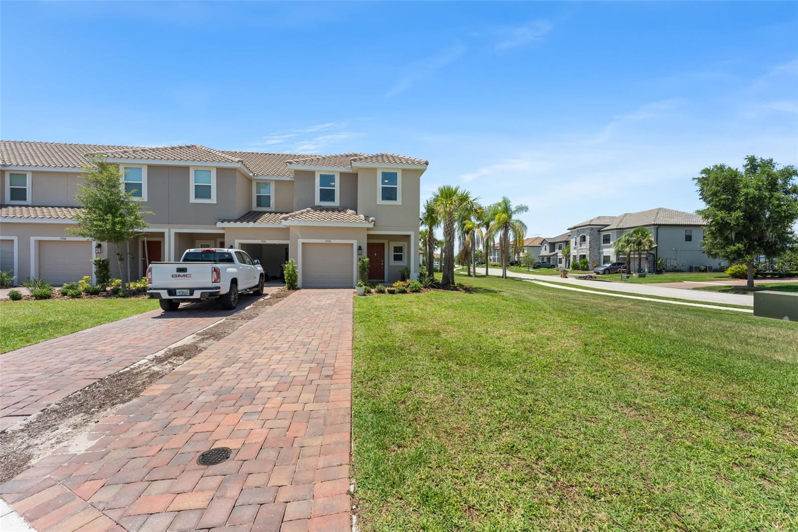 **This house comes with a REDUCED RATE through the seller's preferred lender. This is a lender-paid rate buydown that reduces the buyer's interest rate and monthly payment.**

Welcome to 3556 Landing Net Drive, a rare corner-unit townhome in Bellalago offering 3 bedrooms, 2.5 bathrooms, a 2-story layout, and an exceptional setting with water views on three sides. Perfectly positioned on a premium homesite, this property offers a strong sense of space, privacy, and serenity within one of Central Florida’s sought-after gated waterfront communities.

Inside, the home provides comfortable, low-maintenance living with a practical floorplan designed for everyday convenience. The main level offers connected living, dining, and kitchen areas, creating an easy flow for relaxing or entertaining, while the 3-bedroom layout upstairs provides privacy and flexibility for residents, guests, a home office, or additional storage.

Outdoor living is a standout feature, with an open patio that provides the perfect place to enjoy morning coffee, unwind in the evening, or take in the surrounding lakefront scenery. The corner-unit position enhances the views and creates a more open feel, with panoramic outlooks toward Bellalago’s main lake, resort-style amenity center, and nearby waterfront estates.

Bellalago offers an impressive collection of amenities, including community pools, clubhouse, park, playground, fitness center, tennis and pickleball courts, walking trails, recreational facilities, private boat ramps, and access to Lake Tohopekaliga. The community is designed for an active Florida lifestyle with options for boating, outdoor recreation, fitness, and social gathering.

Located in Kissimmee, the property offers convenient access to shopping, dining, schools, parks, major roadways, and Central Florida attractions. The Bellalago area is known for its waterfront setting, gated-community lifestyle, and access to Lake Toho, while still keeping everyday conveniences within reach.
