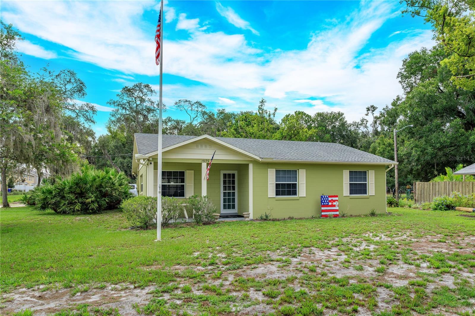 Welcome to this exceptional 3-bedroom, 2-bath home situated on nearly 2.5 acres in the highly desirable and rapidly growing area of Ocoee. Offering the perfect blend of privacy, space, and convenience, this unique property also has the potential to be zoned for agricultural use, providing endless possibilities. A standout feature is the separate one-bedroom apartment located above the detached garage, complete with its own living room, kitchen, dinette area, and full bathroom. This versatile space is ideal for generation rental income, accommodating a college student, creating a private guest suite, or providing comfortable living quarters for an elderly parent. Inside the main home, you'll love the open-concept floor plan that creates a bright and inviting atmosphere, perfect for everyday living and entertaining. Relax and unwind on the screened back porch while enjoying the peaceful surroundings. The roof was replaced in 2017, and both the primary and guest bathrooms have been beautifully remodeled, offering modern style and peace of mind. Conveniently located near major highways, shopping, dining, and entertainment, this property offers the rare opportunity to enjoy acreage while remaining close to everything Central Florida has to offer. Don't miss your chance to own this one-of-a-kind property in one of Ocoee's most sought-after and up-and-coming locations. Schedule your private showing today.