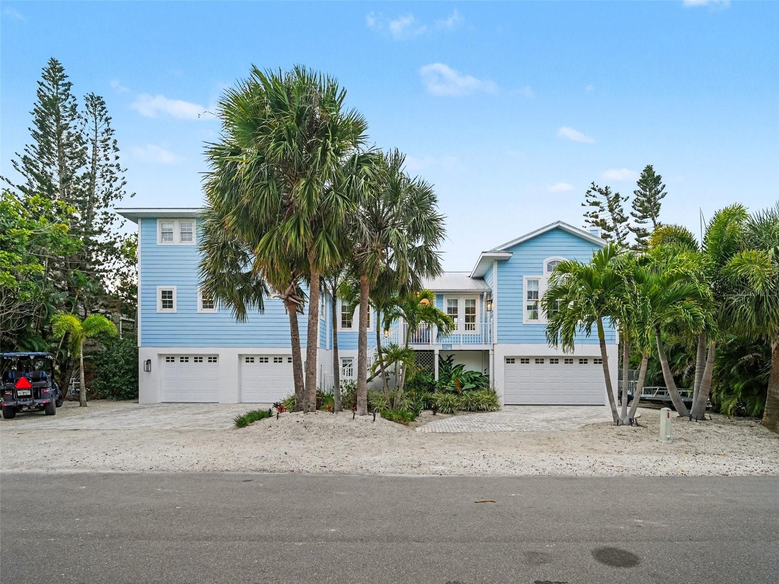 Welcome to 129 Hammock Road, where island dreams meet modern luxury. This 4-bedroom, 3-bath canal 
front pool home has been completely transformed for the buyer who wants more than a property they want a lifestyle. Whether you’re searching for a full time residence, a second home to escape to, or an investment with strong rental potential on Anna Maria Island, this home delivers it all with ease. Nightly rental allowed. 

From the moment you step inside, the home feels calm, elevated, and intentional. Sunlight pours through new impact slider doors, highlighting new hardwood floors, designer fixtures, and refined coastal details. The remodeled kitchen and bathrooms feature new tiling, quartz surfaces, and stylish finishes that feel both current and timeless perfect for hosting guests, family, or future renters.

Out back, your private oasis awaits. The heated saltwater pool sits on a travertine patio framed by tropical landscaping, creating a space that feels like a boutique resort. Enjoy morning coffee by the water, afternoons floating in the sun, and evenings watching the sky fade behind the canal. The newly replaced dock with new pilings and composite decking opens the door to adventure—kayaking, paddleboarding, boating, or simply taking in the peaceful waterfront. Pool features a raised equipment platform, new pool pump and heater, and even a built in basketball hoop make the outdoor space as practical as it is fun.

The rare 4 car garage with screening and double garage doors provides room for vehicles, golf carts, beach gear, and storage, an essential feature for both full time living and high performing vacation rentals. With new pavers, a newer zoned air conditioner, and thoughtful updates throughout, the home feels move-in ready from day one.

Here, you’re not just buying a home you’re stepping into the Anna Maria Island lifestyle. The Gulf beaches, Pine Avenue boutiques, waterfront dining, sunsets, salt air, golf carts, boat days, and barefoot weekends… they’re all just minutes away.

For the buyer who wants income opportunity, but also wants somewhere they’ll be proud to call home. For the buyer looking to settle in, invest smart, and finally live the island life they’ve been dreaming of—this is it.