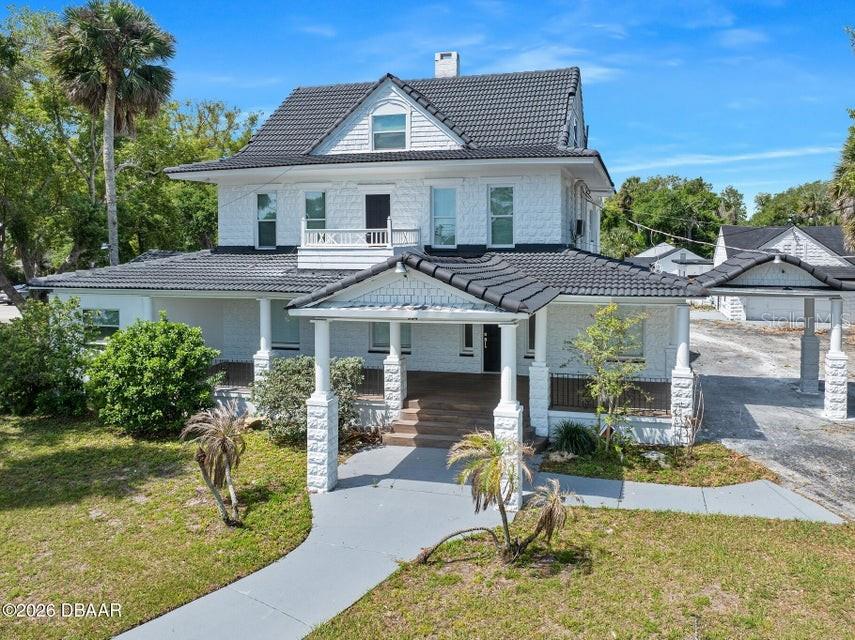 Discover a landmark commercial opportunity in Daytona Beach, where historic charm meets modern investment potential. Originally built in 1910 as the stately private residence for a prominent doctor and his family, this distinguished property has gracefully evolved, standing the test of time through meticulous transformations. Now, it presents an unparalleled, fully renovated, high-yield asset just one block from Daytona's burgeoning redevelopment district.

Spanning an impressive 9012 square feet, this turnkey offering features a remarkable 25-bedroom configuration, many with private baths, alongside five fully independent apartments. A comprehensive top-to-bottom renovation ensures peace of mind, boasting a new roof, new windows, and completely updated electrical, plumbing, and HVAC systems. Designed to maximize cash flow, the versatile layout supports multiple lucrative revenue streams, including co-living, workforce housing, short-term rentals, or traditional multifamily leasing.

Positioned on highly visible Ridgewood Avenue, with close proximity to the beach, retail, dining, and major thoroughfares, this asset is built for strong occupancy and consistent returns. Explore the enduring legacy and exceptional income potential of this unique Daytona Beach investment.
