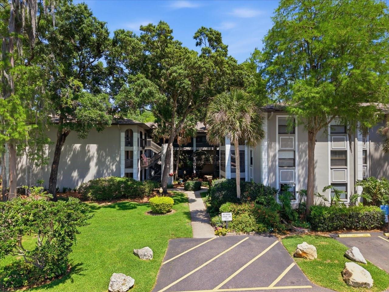 Welcome to 3399 Mermoor Dr, Apt 101, located in the highly desirable East Lake corridor of Palm Harbor! This well-maintained first-floor corner condo offers a comfortable and convenient lifestyle with approximately 1,030 square feet of living space, featuring 2 spacious bedrooms and 2 full bathrooms in a thoughtfully designed layout. Step inside to find a bright and inviting interior that flows seamlessly out to a private screened-in lanai, perfect for enjoying Florida’s year-round sunshine without the bugs with a view of the lake. The home has seen key updates, including a 1-year-old A/C system, garbage disposal, and dishwasher, giving buyers peace of mind on major components.
Located in a community that typically sits in a non-flood zone (Flood Zone X), this property offers added confidence and potential insurance savings. The HOA fee covers exterior maintenance, grounds upkeep, and access to desirable community amenities such as a sparkling pool, clubhouse, and well-kept common areas, creating a low-maintenance lifestyle ideal for seasonal or full-time residents.
Nestled just minutes from top-rated schools, shopping, dining, and beautiful Gulf Coast beaches, this condo combines comfort, convenience, and value in one of the most sought-after areas of Pinellas County. Whether you’re looking for a primary residence, vacation home, or investment opportunity, this one checks all the boxes.