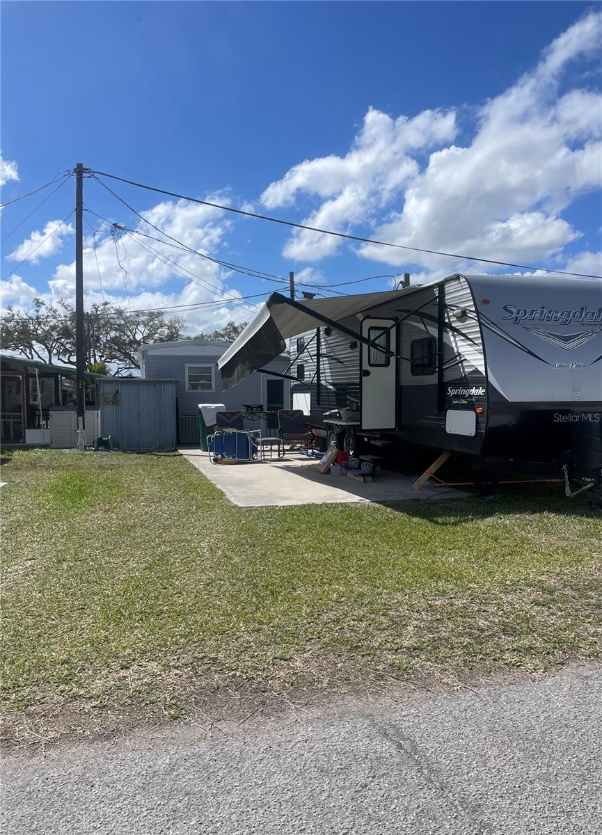 Welcome to lovely Jet Park! Jet Park is a great low key, active 55+ community located in a great central location of Palmetto. Close to shopping, restaurants, groceries and many major thoroughfares.  Low monthly fees of only $195 per month.  Bring your RV, trailer, 5th wheel to Florida whenever you want! Sites will also accommodate a mobile home or park model. Jet Park has a boat ramp for the residents which gives you direct access to the Gulf of America.  There is also a picnic area with fire pit, kayak launch, shuffleboard, pool, full clubhouse with kitchen. This corner lot offers upgraded pavers for a beautiful patio area. Lots can fit motorhomes or you may put a mobile home on it.
Lot 41 x 28