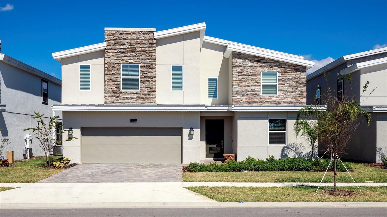 The only WATER VIEW home currently available in ChampionsGate! This beautifully furnished 8-bedroom, 5-bathroom pool home offers the perfect blend of luxury, comfort, and investment potential in one of Central Florida's premier resort communities. Enjoy peaceful waterfront views from your private screened, heated pool and spa, an open-concept floor plan, upgraded flooring with no carpet, a theater room, and a spacious game room. Located behind a 24-hour guard-gated entrance, residents and guests enjoy world-class amenities, including multiple clubhouses, resort pools, lazy river, waterslide, fitness center, tennis and volleyball courts, tiki bar, and more. HOA includes lawn care, internet, cable, and daily valet trash service. Just minutes from Disney, golf, shopping, and dining, this turnkey property is an exceptional opportunity for second home, vacation home, or high-performing short-term rental. Opportunities like this are rare - ESPECIALLY THE ONLY WATER VIEW HOME AVAILABLE in ChampionsGate. Schedule your private showing today before it's gone.