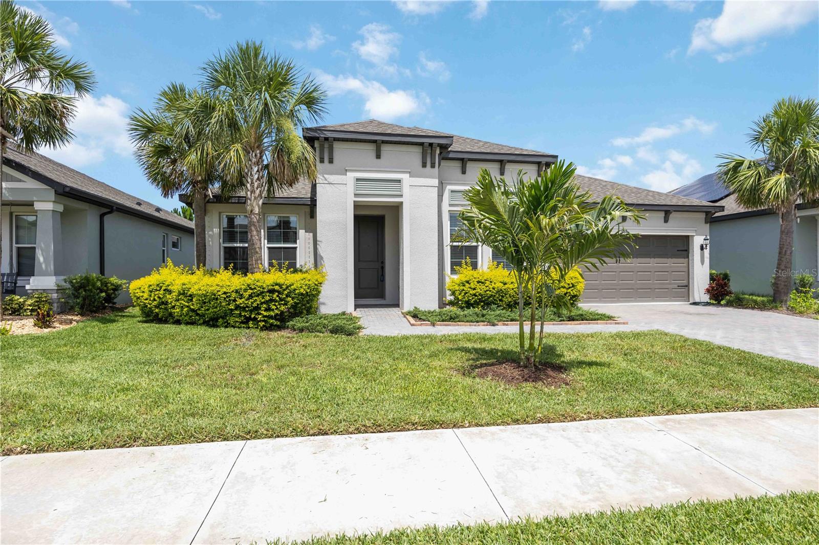 One or more photo(s) has been virtually staged. Enjoy modern, single-story living in this 2022 MI Homes “Jackson” model located in Riverside Preserve Phase II. This thoughtfully designed residence offers 2,811 sq ft of open living space with soaring ceilings, an inviting indoor-outdoor flow, and a layout ideal for both everyday living and entertaining.
The kitchen anchors the main living area with generous prep space, quality appliances including a wine refrigerator, and seamless connection to the great room and dining area. The primary suite provides a comfortable retreat with a spacious walk-in closet and private bath, while three additional bedrooms and a dedicated study/den offer flexibility for guests, work-from-home needs, or hobbies. Architectural details such as tray ceilings, crown molding, a wet bar, and a mix of tile, wood, and carpet flooring add character and function throughout.
Step outside to the covered lanai and enjoy relaxed Florida living with space to dine, entertain, or unwind.
Riverside Preserve is a gated community featuring sidewalks, park areas, clubhouse access, and nearby river access for kayaking, fishing, and outdoor recreation. Conveniently located near shopping, dining, golf courses, Lakewood Ranch, and major roadways, this home offers a peaceful setting with easy access to everyday amenities.

Buyer to verify all measurements, community rules, and restrictions.
