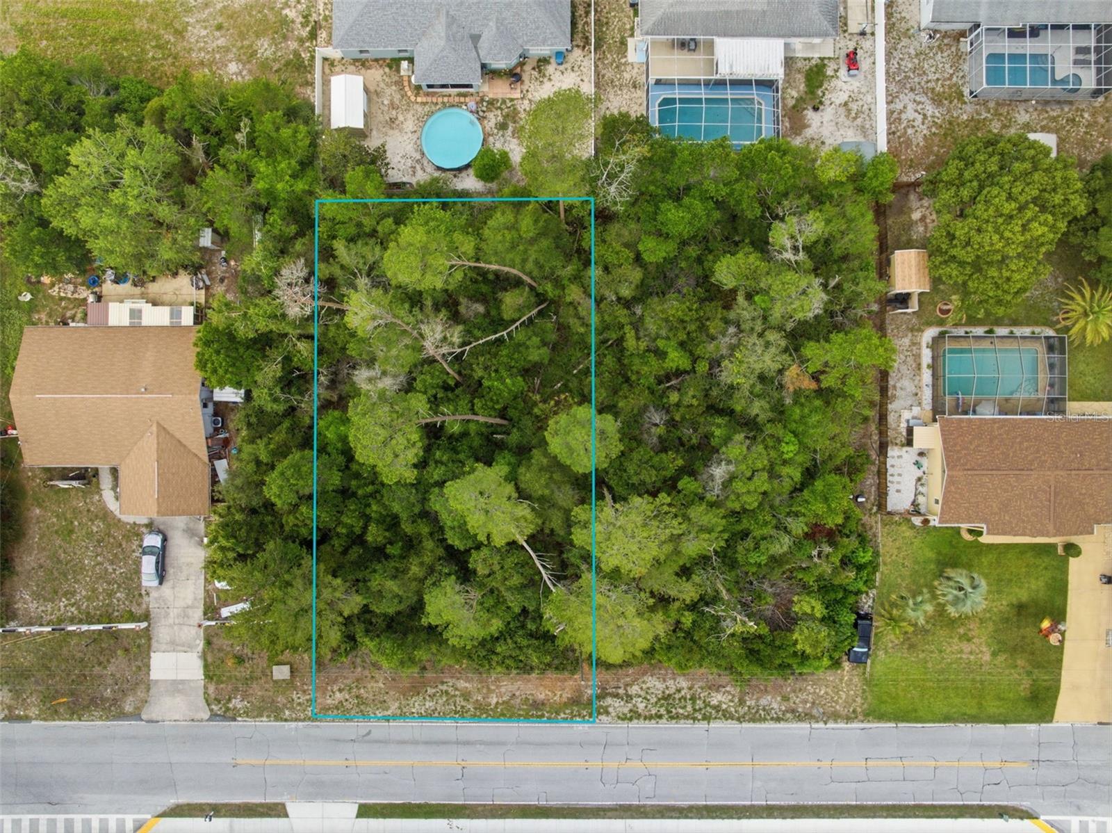 Opportunity knocks in the heart of Florida’s Nature Coast with this nearly ¼-acre vacant lot located on Spring Hill’s desirable west side. Whether you’re a builder looking for your next opportunity, an investor searching for future potential, or a buyer ready to design a custom Florida dream home, this property offers flexibility, location, and potential all in one. Even better? The neighboring lot is also available for purchase, creating a rare opportunity to secure two side-by-side sites for expanded building options, multi-home development, or added privacy.

Surrounded by established homes while still offering a peaceful, tucked-away feel, this property is ideally positioned for those who appreciate Spring Hill’s relaxed coastal lifestyle and growing demand for new construction. Conveniently located just off US-19 with easy access to the Suncoast Parkway, commuting to Tampa and surrounding areas remains simple while still enjoying the quieter charm Hernando County is known for.

Outdoor lovers will appreciate being just minutes from some of the Nature Coast’s most iconic destinations including Weeki Wachee Springs State Park, famous for its crystal-clear spring waters, kayaking, paddleboarding, river boat tours, and legendary live mermaid shows. Spend weekends floating down the Weeki Wachee River, exploring nearby preserves, or enjoying waterfront dining and boating in Hernando Beach.

You’re also a short drive from Pine Island Beach Park, Hernando County’s only public beach offering Gulf sunsets, fishing, kayaking, and a true Old Florida atmosphere locals love. Nearby nature preserves, hiking trails, and wildlife areas provide endless opportunities to enjoy Florida’s outdoor lifestyle year-round.

With shopping, dining, healthcare, schools, and everyday conveniences all nearby, this location perfectly balances peaceful living with accessibility. Buy one lot or take advantage of the rare opportunity to purchase both side-by-side parcels and maximize the possibilities.