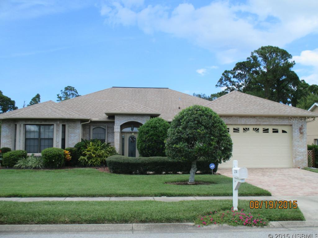 ONE OF A KIND!  Custom built Estate home with one owner just installed brand new carpet in all bedrooms.  Never been on market.  Golf Front and Water Front.  Views of 16th Green and 17th Tee from large covered screened porch.  Also lovely lake views from porch & MBR.  Nat Gas Hookup for BBQ.  Very open plan with vaulted ceilings and tile throughout living areas.  Enormous living/dining/ and gathering room with natural gas fireplace.  Custom designed kitchen, many drawers, tall cabinets, wine rack and with party sized center island with granite counters surrounded by numerous cabinets AND more counters.  Split bedroom concept with well planned design features in Master BR including:  walk n closet, jet tub, & double sinks.  All doors are handicap accessible.  Inside laundry centrally located.  This is a must see home that has been meticulously cared for.   Accordian hurricane shutters on every window and door.  Dual pane windows.  Virtual Tour:  http:aw360.me/1025641 ;Water: City