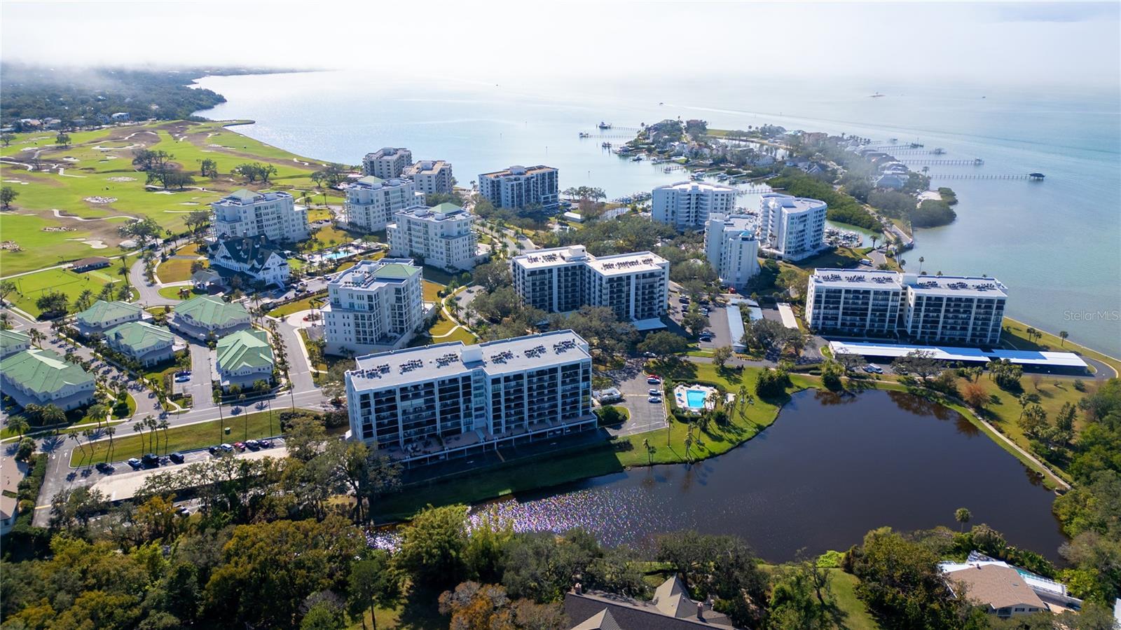Resort-Style Living in the Exclusive Belleview Biltmore Community

Welcome to a rare opportunity for luxury living in the prestigious Belleview Biltmore community of Belleair, Florida. This meticulously maintained, fully furnished, and turnkey residence offers a spacious floor plan, abundant natural light, and breathtaking views of the Intracoastal Waterway, Clearwater Beach Bridge, and serene community pond—all from an expansive private balcony.

Skip the six-year waitlist and gain immediate access to Florida’s first premier Golf & Country Club—Belleair Country Club. Established in 1897, this historic club boasts two Donald Ross-designed golf courses, as well as tennis and pickleball courts, croquet courts, two resort-style pools, a marina, a state-of-the-art fitness center, and exceptional dining experiences.

Inside, every bedroom, including the master suite with an en suite bath, offers stunning water views and balcony access. The coastal-inspired upgrades add to the home’s elegance, making it perfect for full-time residence or a vacation getaway.

As part of this sought-after community, you’ll enjoy access to a clubhouse with a year-round heated pool overlooking the Intracoastal Waterway—ideal for socializing and relaxation.

Located just minutes from downtown Dunedin, one of America’s most charming and walkable towns, you’ll find boutiques, cafes, breweries, and scenic waterfront parks. Love the beach? World-famous Clearwater Beach, ranked #1 in the U.S., is just a short drive away. Sports enthusiasts will also appreciate the proximity to spring training stadiums for the Toronto Blue Jays and Philadelphia Phillies. Plus, you’re near Tampa Bay’s cultural venues and international airports, ensuring convenience and entertainment year-round.

With a recent architectural integrity milestone report and reserve study completed, this well-maintained building offers peace of mind for years to come.

Don’t miss your chance to own a slice of Florida paradise in this exclusive community!