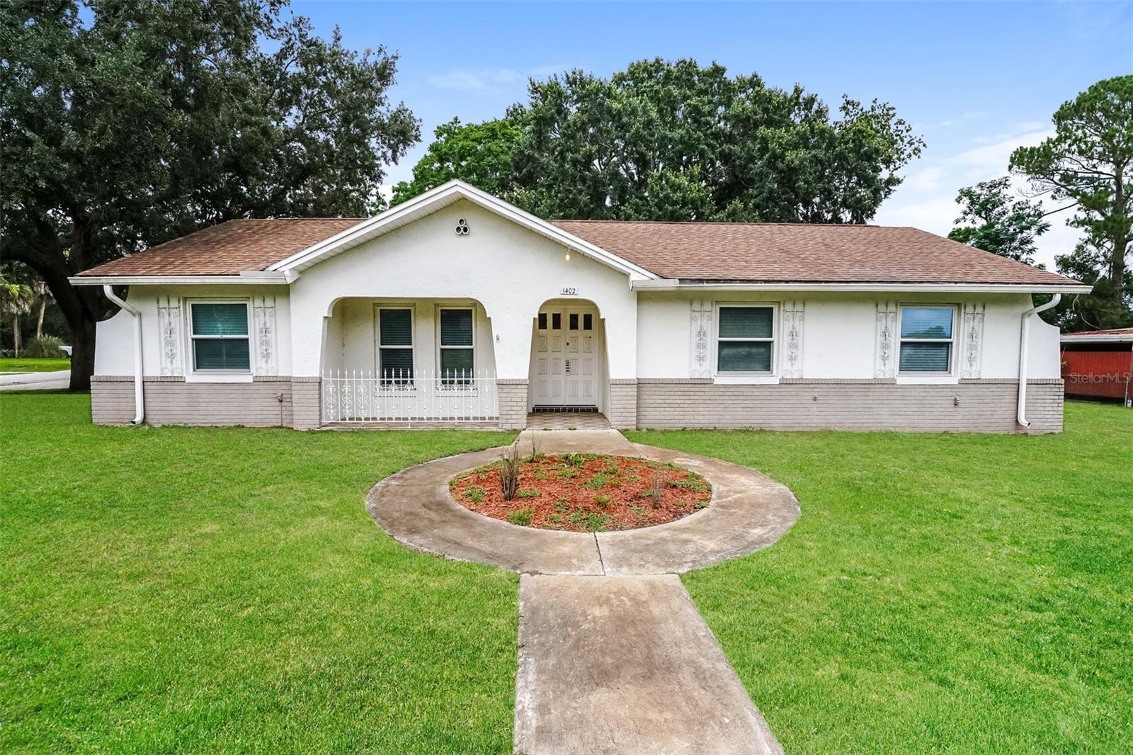 Charm and curb appeal abound for this Deltona home! Step inside into the inviting foyer and into the well-appointed living room, which is positioned at the front of the home. Through the dining room you'll find the kitchen, which boasts chic black appliances, hard surface countertops, and ample storage. This ranch style floorplan is rounded out by a secondary family room, the primary suite, and two additional bedrooms. Come and see for yourself the possibilities that this home has to offer!