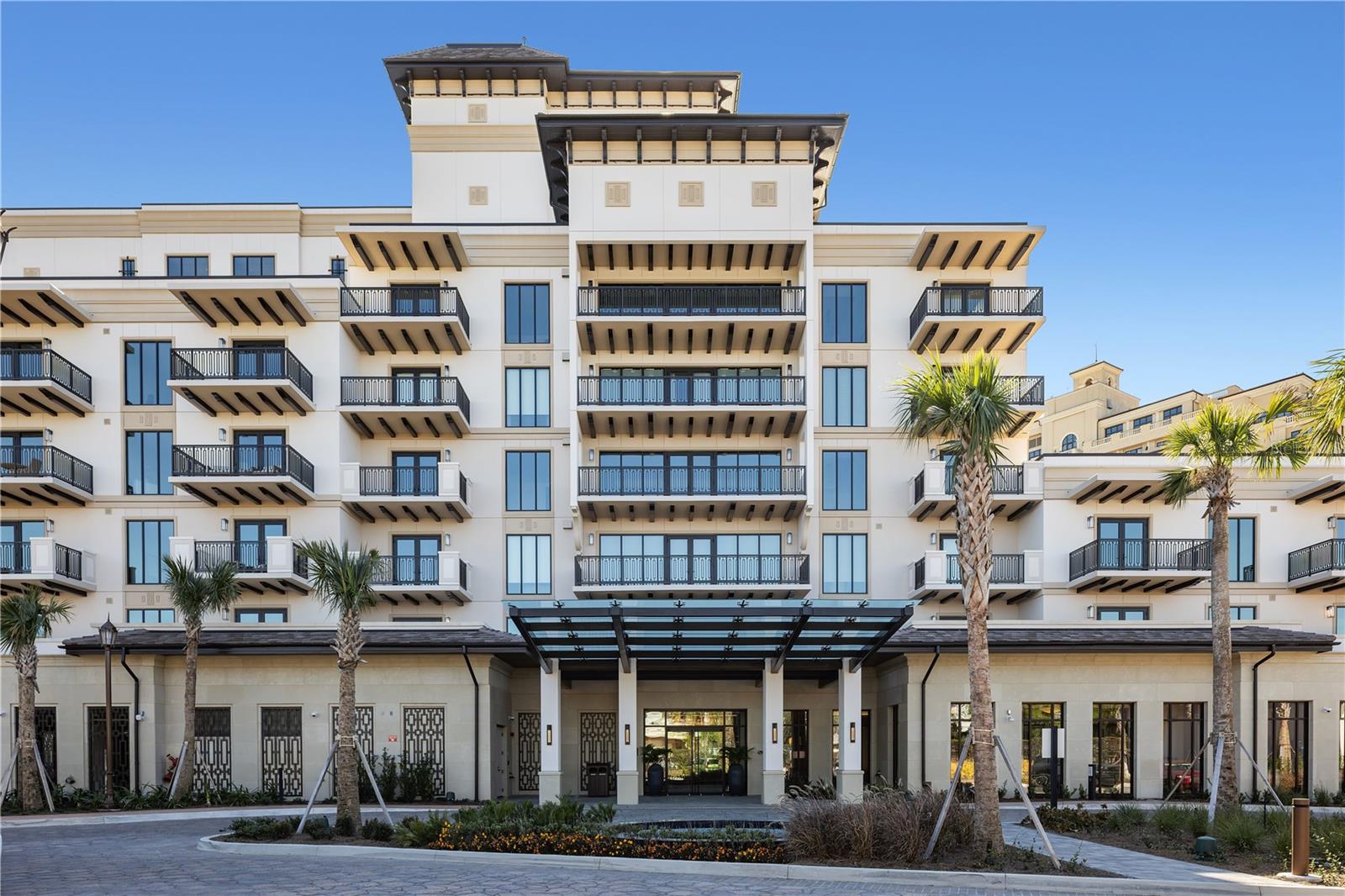 A new luxury Four Seasons Private Residences opportunity is now available at Golden Oak at Walt Disney World® Resort. The Florian Park project by HHR FSO LAND LLC will feature a collection of nine attached boutique homes and 31 luxe residences, including five stunning multi-level penthouses, all within a single, elevated residential address. Designed for hotel-inspired living at a magical address, these residences deliver a resort lifestyle enhanced by Four Seasons’ world renowned service. From the sun-filled gathering spaces and gourmet kitchen, to the generously proportioned primary bath, each Luxe Residence is filled with warmth and refinement. The Serenade Luxe Residence features 4,299 square feet with 3 en-suite bedrooms and 2 flex spaces. Stunning living space with custom-built shelving featuring natural stone and warm, wooden accents. Gourmet kitchen with frameless contemporary cabinetry, a large center prep island, a spacious pantry with built-in cabinetry and refrigerated wine storage. Premium finishes including Wolf, Subzero, and Cove appliances enhance the gourmet kitchen, while other features include thoughtful balcony placement, and modern-transitional design. Golden Oak is a gated residential resort community where families can enjoy luxury, privacy, and the magic of Disney. It features distinctive neighborhoods with magnificent homes, expansive natural preserves, and a range of inviting amenities. Residents will have access to Golden Oak’s private clubhouse, Summerhouse, with superb dining, courtyards, a pool area, fitness facilities, and a family room. Additionally, residents can enjoy Club Life, which includes services like park transportation, signature club events, theme park experiences, and much more. As Four Seasons residents, owners will have access to exceptional services such as in-home dining, poolside food and beverage service, dog walking areas, and more. Exclusive privileges also include access to the Four Seasons Resort Orlando amenities, such as the Fitness Center, Tennis and Pickleball courts, the 13,000-square-foot spa, and the acclaimed Tom Fazio-designed Golf Course. Members also have the opportunity for unlimited golf and invitations to special events.