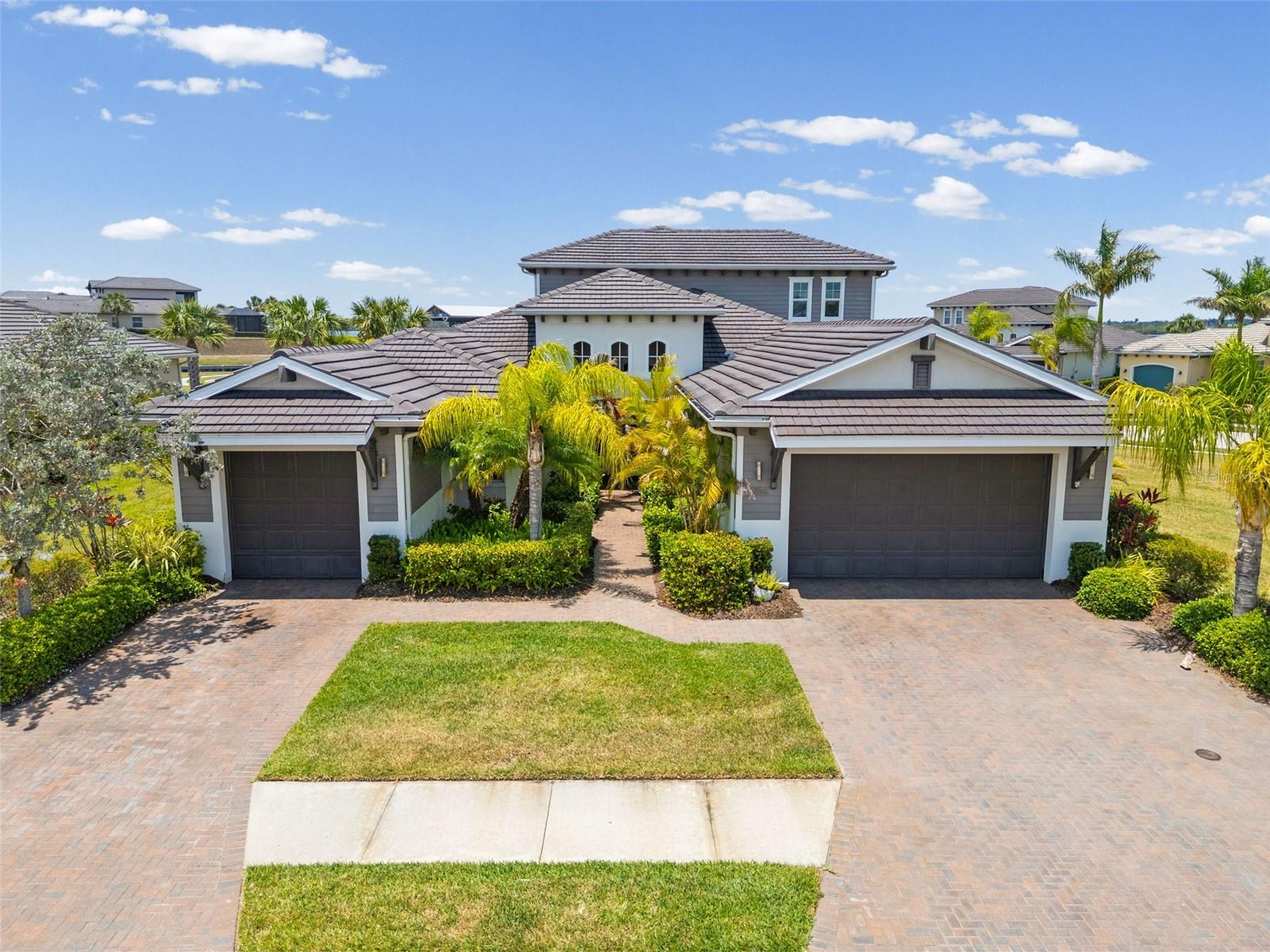 Welcome to paradise in the highly desirable, 24-hour staffed and gated boating community of Tidewater Preserve! Situated on one of the largest, meticulously landscaped, and custom-lighted lots in the entire subdivision, this exceptional estate stands out as one of the community's finest homes! Step outside into your private, custom backyard oasis! The sprawling outdoor living space features a pristine saltwater pool with lighting, a relaxing hot tub, an elegant travertine deck, huge side yard with no neighbors on one side, and a mosquito misting system. The expansive lanai is fully equipped with outdoor kitchen and remote-controlled drop-down screens, ensuring effortless pool side meals and comfort. Inside, the home is loaded with premium upgrades! Key features include designer lighting and draperies, quartzite counters, custom office, a professional security system, custom closet organizers, a brand new reverse osmosis water filtration system and water softener, and new paint/wallpaper. This home is also in close proximity to the boat lift, making it a breeze to load up the family for a fun day on the water! The garages are equipped with epoxy floors. Tidewater Preserve offers an unparalleled resort lifestyle! Water enthusiasts will love the private marina with boat slips available for rent, a kayak launch, and kayak storage racks. The community boasts three sparkling pools, premier fitness centers, three Har-Tru tennis courts, a dog park, and a tot lot. There are simply too many upgrades and features to list. Contact us today for a private tour and to receive the complete list of recent premium upgrades completed since the last purchase!