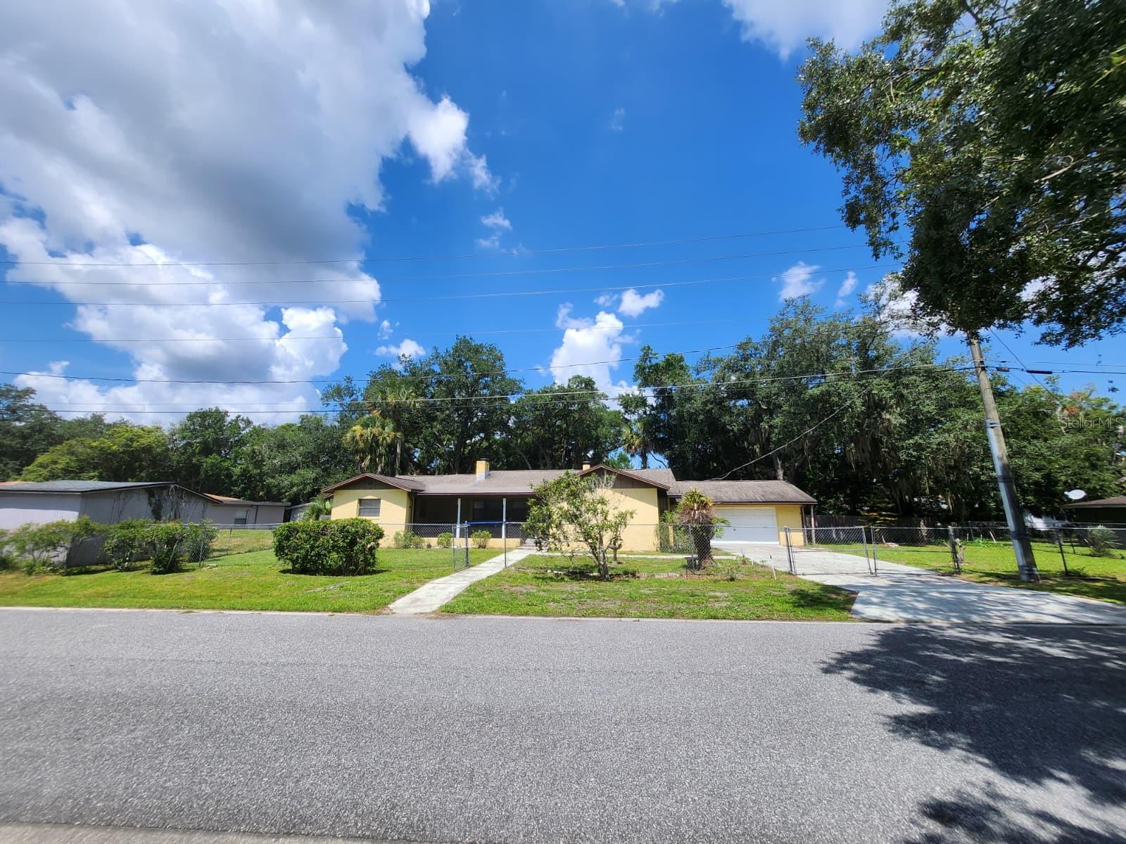 AGENTS - PLEASE VIEW REALTOR REMARKS IN THE MLS. **INVESTMENT OPPORTUNITY** Located in a quiet, laid back area in Sanford, is this large 4-bedroom, 3-bathroom home that has 2,512 square feet of flexible living space. The primary suite has a modern updated bathroom with a stand-alone tub, offering a great start to your investment. Additional improvements include a newer roof and HVAC system, plus a newer water heater for peace of mind. The home features TWO WOOD BURNING FIREPLACES that anchors cozy living areas. THE ENTIRE PROPERTY IS FENCED, creating a defined space for outdoor privacy, while the large rear private yard invites gardening or get-togethers, NO REAR NEIGHBORS! A LARGE SHED adds more storage or a workshop. LARGE GARAGE featuring a utility sink and a newer garage door opener. The LARGE SCREENED IN FRONT PORCH makes for a perfect place to sit outside and enjoy the view. A side entrance off the kitchen opens up other possibilities for a separate suite. The GATED DRIVEWAY enhances safety and privacy. Situated in a tranquil area yet close to the Sanford Int'l airport, this home combines comfort, practicality, and location in one compelling package. To truly appreciate this home and its details, it is a must see in person property! Schedule a showing today to see for yourself the opportunity here. All showings are by appointment only.

Offers may be entered ONLINE through Friday, July 10, 2026 at 4:00 pm.

AT SELLER'S DISCRETION, A SUBMISSION MAY BE ACCEPTED AT ANY TIME.