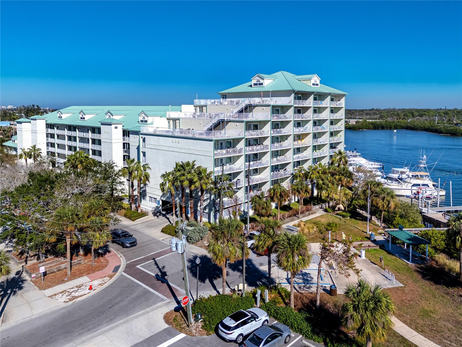 Experience the best of beachside living and investment potential with this beautifully appointed 3-bedroom, 2-bath condo in Harbourside at Marker 33, located in the heart of Indian Rocks Beach. Offered fully furnished and turnkey, this coastal retreat is just moments from the sand and showcases stunning views of both the Intracoastal Waterway and the Gulf of Mexico from its private balcony.

Inside, the open-concept design is bright and inviting, highlighted by luxury vinyl wood flooring, tasteful coastal décor, and a sunlit breakfast nook framed by floor-to-ceiling windows. The kitchen is well-equipped for everyday living or hosting guests, featuring granite countertops, upgraded wood cabinetry, a built-in workspace, and a convenient in-unit laundry closet.

The spacious primary suite comfortably accommodates guests with two queen beds, a Smart TV, and a private en-suite bath with walk-in shower. A second bedroom offers a king bed, water views, and access to a full bath with a walk-in closet, while the third bedroom features bunk beds, making it ideal for additional guests or families.

This property is perfectly suited for short-term rentals, allowing 3-day minimum stays and benefiting from relatively low HOA fees—an appealing combination for investors and second-home buyers alike. Ownership includes access to the popular on-site Splash Harbour Waterpark, complete with a lazy river, slides, heated pool, and four daily passes. Additional amenities include a Tiki bar, Jimmy Guana’s waterfront restaurant, rooftop sunset deck, mini golf, arcade, and boat and jet ski rentals.

Set in a highly walkable location near local dining, shops, and beach attractions, this pet-friendly (owners, up to 20 lbs) condo offers a rare blend of resort-style amenities, prime location, and strong income potential—all wrapped into one exceptional coastal property.