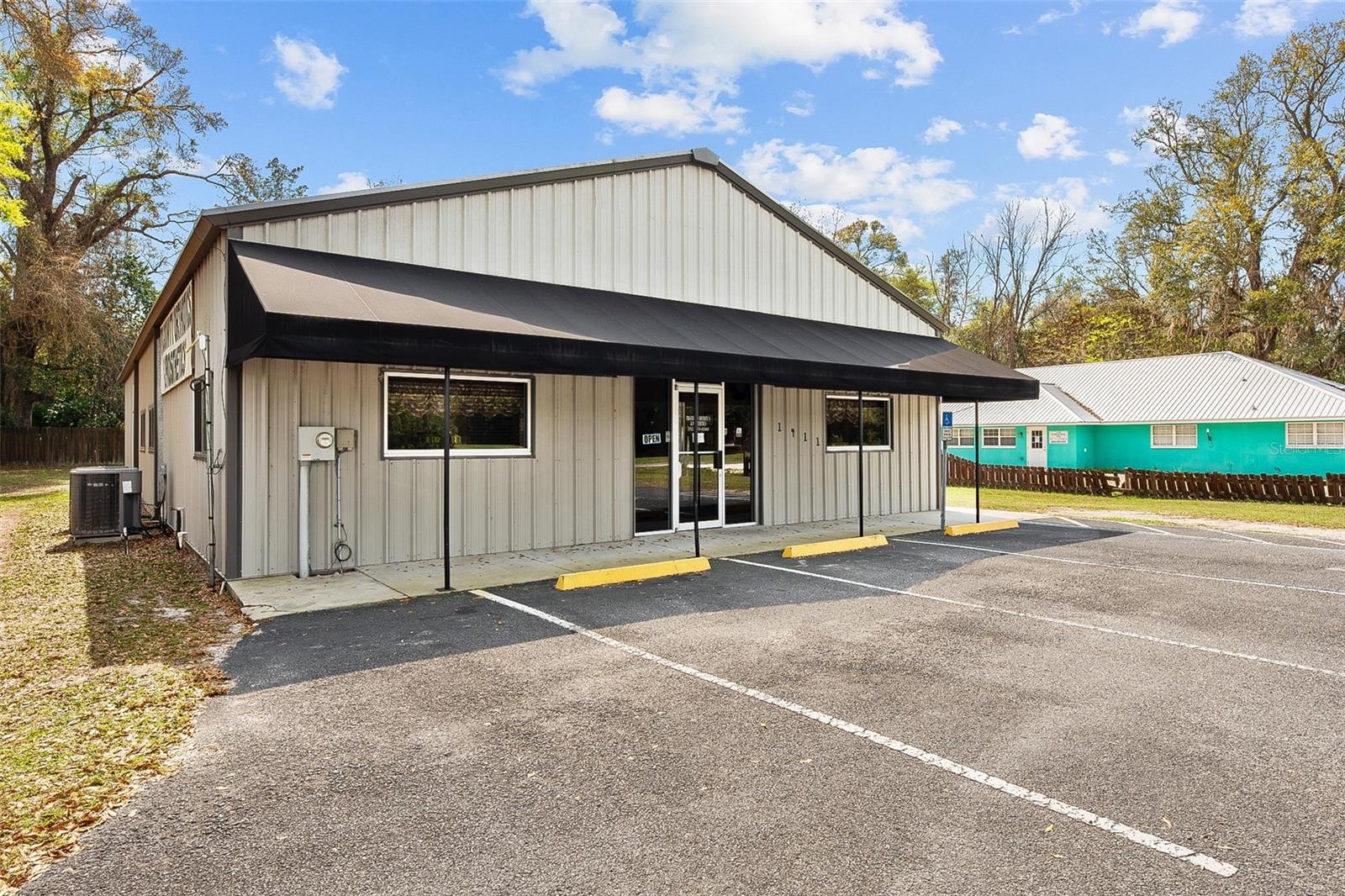 COMMERCIAL PROPERTY FOR SALE! Take a look at this established business in the beautiful town of Chiefland Florida! This property consists of nearly half an acre with a paved 4 vehicle parking lot. Large waiting room, 7 offices, and a kitchenette complete the office. At the back of the office there's a shop perfect for manufacturing and storage. Located amongst numerous thriving businesses with convenient access from well traveled Hwy 19, your new business will get all the exposure you need! Bring your new company to Chiefland and plant your roots here! Call today for more information and schedule a tour!