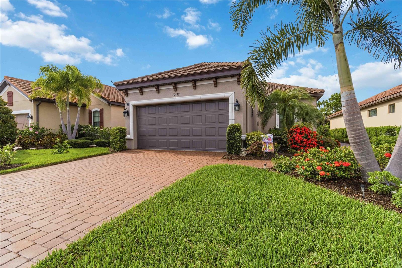 Welcome to this beautiful Taylor Morrison Roma model in the highly sought-after Esplanade at Artisan Lakes! This thoughtfully designed home offers 2 bedrooms, 2 baths, and a versatile den with pocket doors—perfect for a home office, hobby room, or extra space for guests.

From the moment you walk in, you'll appreciate the open, light-filled layout, soaring 10-foot ceilings, 8-foot doors, and light tile flooring throughout the main living areas. The split-bedroom floor plan offers privacy, with the spacious owner's suite tucked away at the back of the home overlooking a private greenspace, while the guest bedroom and den are situated toward the front.

The owner's retreat is a relaxing escape featuring dual vanities, a large walk-in shower, a private water closet, and a generous walk-in closet. The well-appointed kitchen is designed for both everyday living and entertaining, offering white cabinetry, abundant counter space, plenty of storage, and a large island with seating. Just off the kitchen, you'll find a separate dining area ideal for gathering with family and friends.

Step through the sliding glass doors and you'll discover one of the home's best features—an extended screened lanai overlooking the private greenspace. Whether you're enjoying your morning coffee, watching the birds, or grilling dinner in the evening, this outdoor living space is the perfect place to unwind and enjoy Florida living.

Additional highlights include a spacious laundry room with built-in cabinetry and utility sink, plus a two-car garage with room for extra storage. This home has been meticulously maintained and shows true pride of ownership throughout. Simply move in and start enjoying the lifestyle. This home can be purchased furnished or unfurnished.  

Living in Esplanade at Artisan Lakes means enjoying resort-style amenities right outside your door. This gated community features two amenity centers, resort pools, pickleball and tennis courts, dog parks, fitness centers, fitness classes, personal training, water aerobics, spa services, social clubs, wine tastings, cooking classes, arts and crafts, and a full calendar of activities. HOA fees also include lawn maintenance, irrigation, cable, and high-speed internet.

Conveniently located between I-75 and US-41 off Moccasin Wallow Road, you're close to shopping, dining, and the new medical center and hospital currently under construction. Plus, some of Florida's most beautiful destinations—including Anna Maria Island, Siesta Key, and downtown St. Petersburg—are all less than an hour away.

This is more than just a home—it's a lifestyle. Come see why so many people love calling Esplanade at Artisan Lakes home.