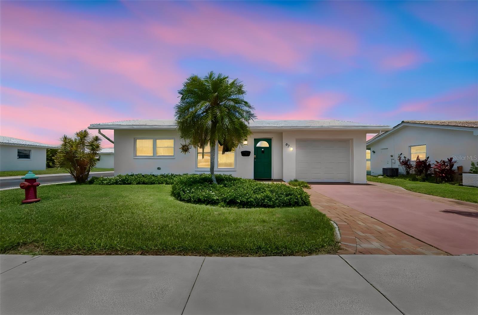 Welcome to easy Florida living in the highly desirable Mainlands community in Pinellas Park — a vibrant 55+ golf-cart-friendly neighborhood known for its active lifestyle, beautifully maintained surroundings, and exceptional amenities. This beautifully renovated 2-bedroom, 2-bathroom, and 1,080 square feet of living space that feels closer to 1,200 square feet thanks to the enclosed, air-conditioned sunroom.

Situated on a spacious corner lot, this home features an open-concept floor plan filled with abundant natural light. The updated kitchen showcases modern finishes and flows seamlessly into the main living and dining areas, while both bathrooms have been tastefully renovated for a true move-in-ready feel.

Major recent improvements provide peace of mind, including exterior paint (2026), water heater (2025), and brand-new appliances (2025). The home also features a 2-ton HVAC system installed in (2023), along with a washer and dryer replaced in (2023).

One of the standout features is the enclosed, air-conditioned patio offering flexible additional living space perfect for relaxing, entertaining, a home office, or enjoying Florida’s sunshine year-round. The owner also added A/C vents to the garage for added comfort and versatility. Additional highlights include an air-conditioned laundry room, a one-car garage, and wheelchair accessibility for enhanced ease of living.

Residents of The Mainlands enjoy access to a heated community pool, shuffleboard courts, clubhouses, social clubs, and the nearby Mainlands Golf Course — a public par-67 Florida Links-style course. Conveniently located in the heart of Pinellas County, the home offers easy access to Gulf beaches, shopping, dining, entertainment, Tampa International Airport, St. Pete-Clearwater Airport, and major Bay Area bridges.

Whether you’re looking for a full-time residence or seasonal Florida retreat, this move-in-ready home offers the perfect blend of comfort, convenience, and low-maintenance living in one of Pinellas County’s most sought-after active adult communities.