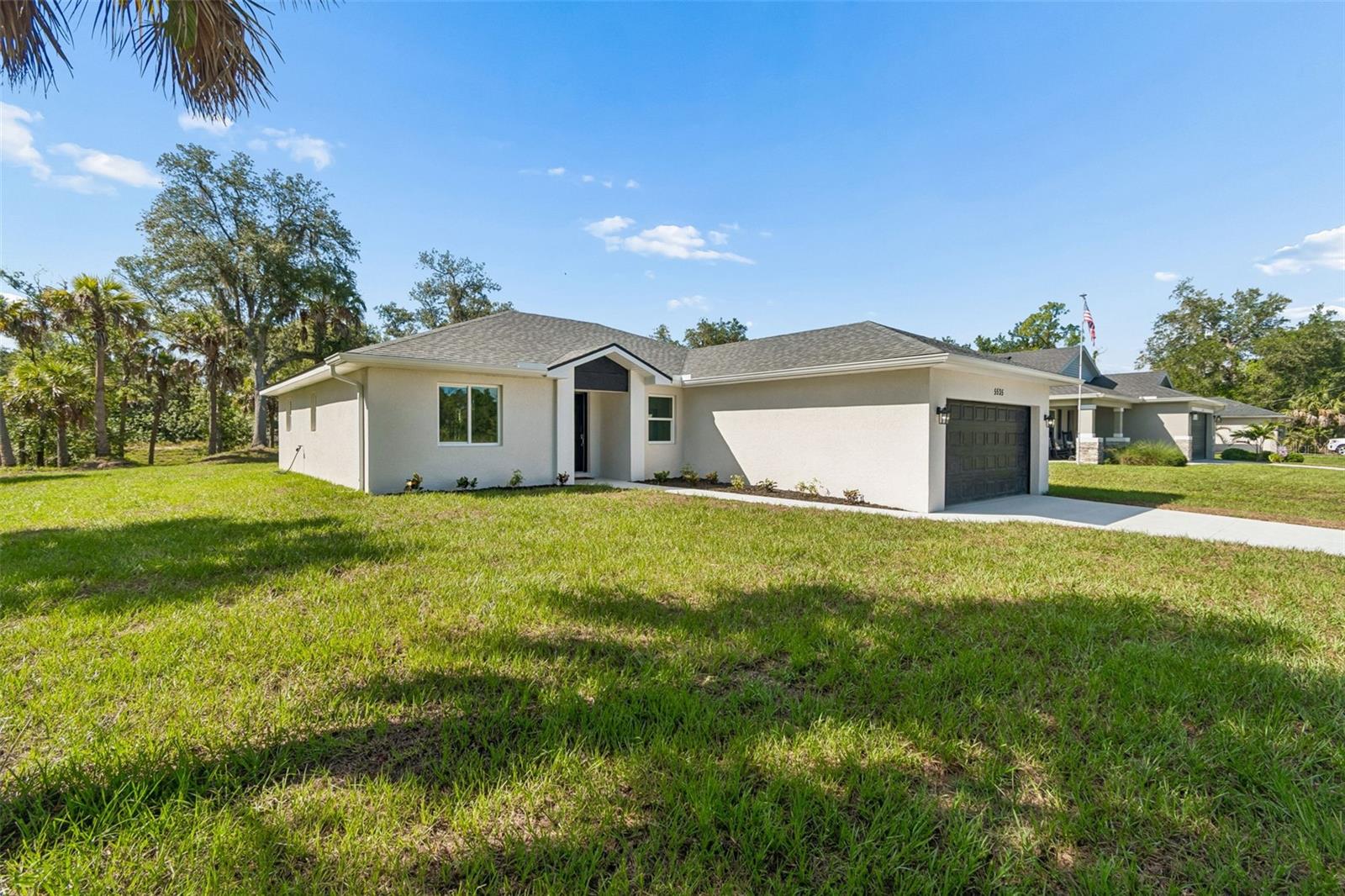 Welcome home to this Beautiful Newly Built 3 Bedroom 2 Bathroom home on a Conservation water lot!! Enjoy the Florida lifestyle with your private, scenic backyard, majestic trees, waterway and peaceful surrounds. When you walk in, immediately feel the calm of the Beautiful neutral Ceramic tile throughout, Energy Star Stainless appliances, Quartz countertops with White Shaker cabinets and Black accents and Thermal Hurricane Impact windows!  The Open Kitchen with Large Island allows for entertaining and ease of living.  The Split floor plan allows for extra living space and privacy.  The Primary Ensuite is pure magic with the separate soaking tub, step in shower, handy linen cabinet, walk-in closet and lengthy dual-sink ensemble! Premium locking system on front door handle and garage door systems with mobile app access. Level Two EV charger in garage.  Beaches, shopping, great schools and activities close by along with easy access to I-75 and US41!! Must see to appreciate! Owner financing with 25% downpayment. Listing agent has ownership interest.