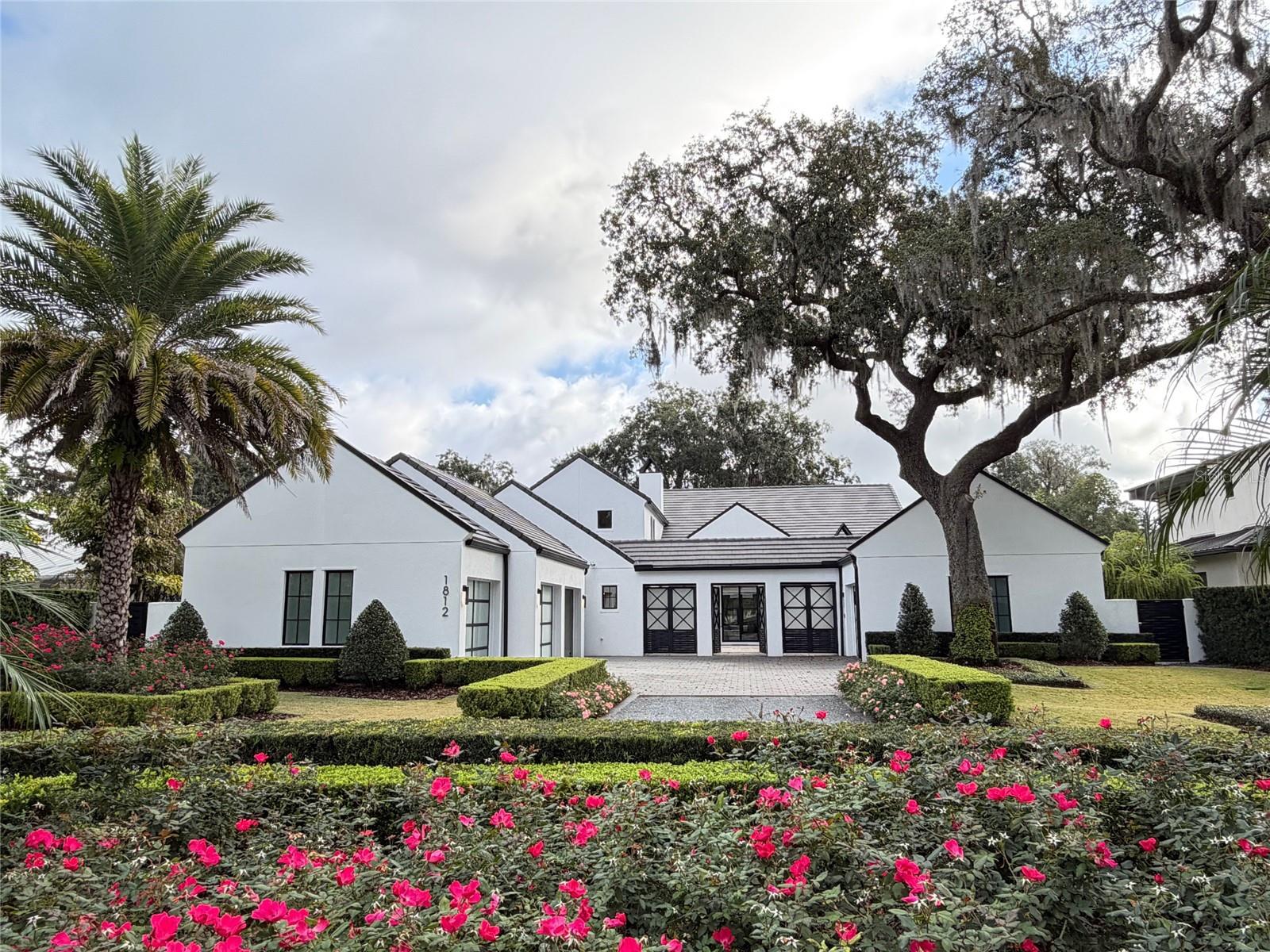SOLD DATA ENTRY ONLY 
Welcome to this exceptional custom residence located on one of Winter Park’s most desirable streets. Built in 2017 and impeccably maintained, this like-new home offers timeless architecture, modern luxury, and thoughtful design throughout.
Offering 6 bedrooms, 6 full bathrooms, and 1 half bath, the home encompasses over 5,100 square feet of living space on a generous half-acre lot, providing both privacy and an impressive sense of scale. Upon entry, engineered hardwood flooring, high ceilings, and abundant natural light set the tone for the refined interiors.The open-concept floor plan seamlessly connects the main living areas, making the home ideal for both everyday living and entertaining. The kitchen is equipped with custom solid-wood cabinetry, premium Wolf and Sub-Zero appliances, a large center island, and ample storage, all opening to the family and dining spaces for effortless flow.The primary suite is located on the main level and offers a peaceful retreat with a spacious walk-in closet and a spa-inspired bathroom. Each additional bedroom is generously sized and features its own en-suite bath, ensuring comfort and privacy for family and guests. Multiple flex spaces throughout the home provide versatility for a home office, gym, or media room.Additional features include a Crestron lighting and sound system, a four-car garage with built-in cabinetry, a cement tile roof, and built-in closet systems throughout. The expansive backyard offers ample room for outdoor living and future enhancements. Ideally situated just minutes from Park Avenue, top-rated schools, dining, and shopping, this move-in-ready home presents a rare opportunity to own a nearly new estate in the heart of Winter Park.