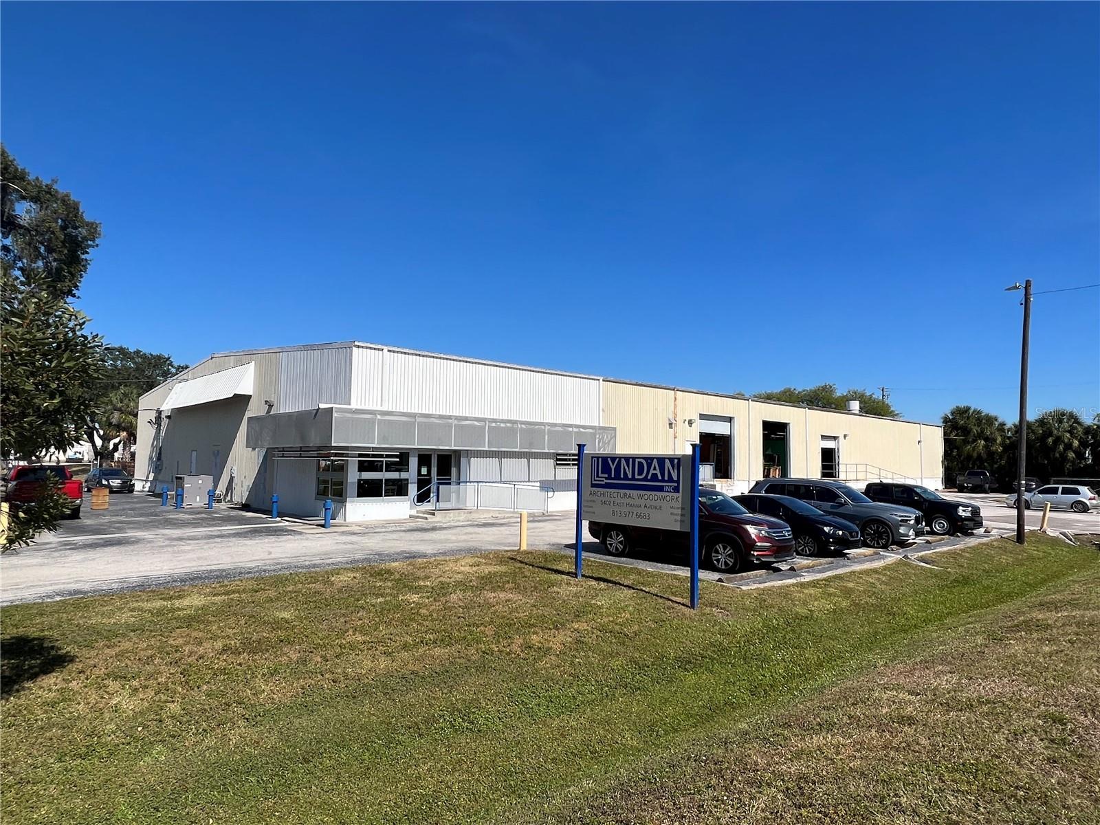 This East Tampa dock high & grade level access warehouse is 20,000 SF and is located on a 1.23 acre (53,340 SF) Manufacturing zoned lot. A rare find in a market starved for industrial warehouse, this site has been the home of Lyndan, a commercial cabinet manufacturer for almost 20 years. The building boasts 1000 amps of 3-phase power and features 2,874 SF of office space with a large reception area, conference room, several private offices, and a large break room connecting to the warehouse. The warehouse has 3,126 SF of rear access grade level warehouse with 2 rollup doors and additional cross access dock high doors for the balance of the 14,000 SF of warehouse which has approximately 14 ft of clear height. The site features a large fenced lay-down storage yard to the rear and parking and truck access along the Hanna Road frontage and sits just 2 blocks from 56th Street just north of Hillsborough Avenue with direct access to Interstate-4.
* Seller requires 90 days post closing to vacate

Located in Tampa just west of 301 / I-4, just 2 blocks from 56th Street and north of Hillsborough Avenue with direct access to Interstate-4.